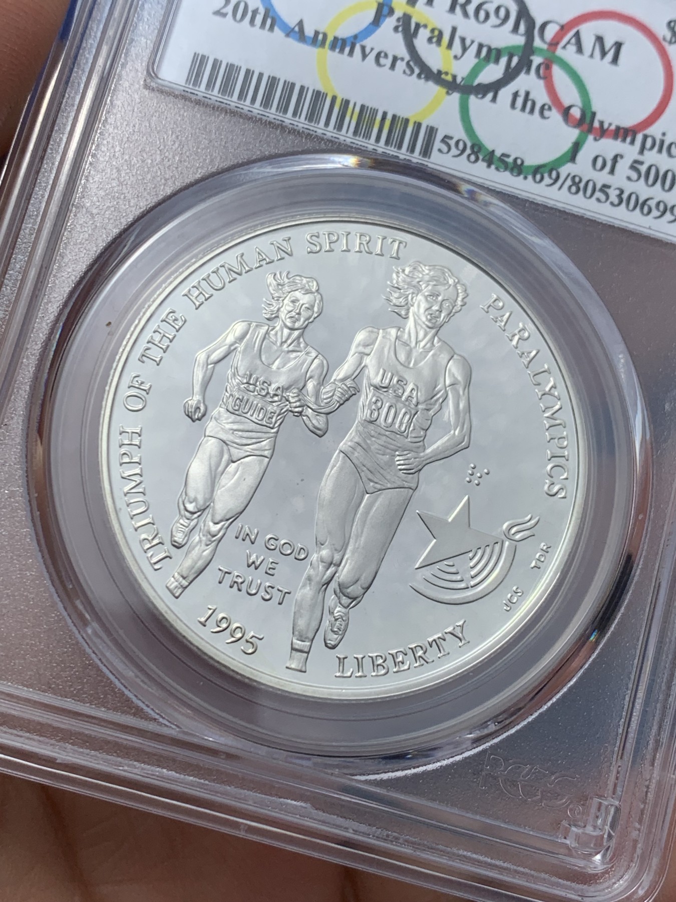 《竞宝斋》第242场-周日，周一 新年开场 (全场包邮) PCGS PR69DC 美国1995年P版残奥盲跑1美元大银币 带奥运标签