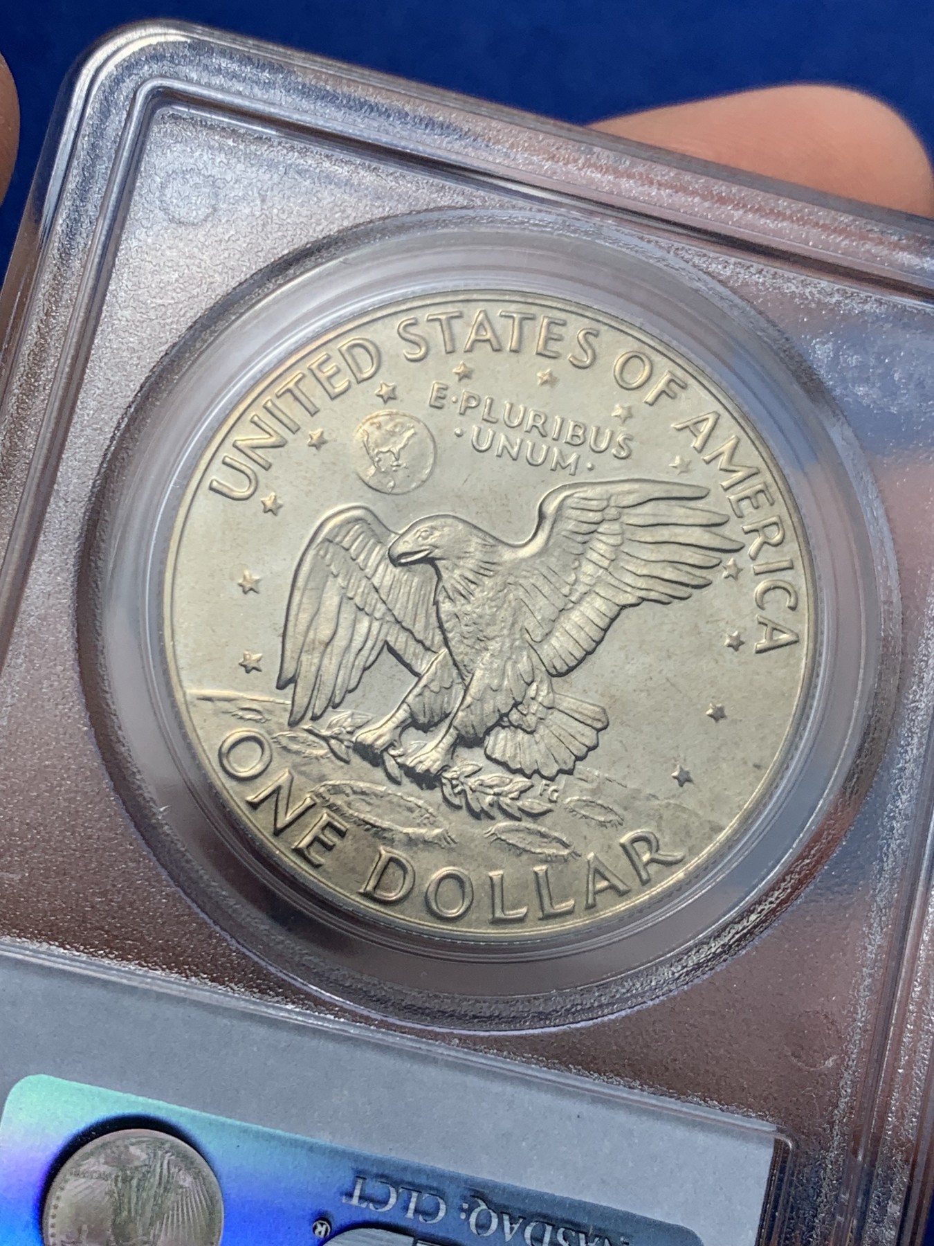 《竞宝斋》第242场-周日，周一 新年开场 (全场包邮) PCGS-PR69DCAM 1973年美国艾森豪威尔1美元精制币，直径38mm，重22.8克，状态极佳，PC早期经典小白盒老盒无官网图，更高评级数量55枚。