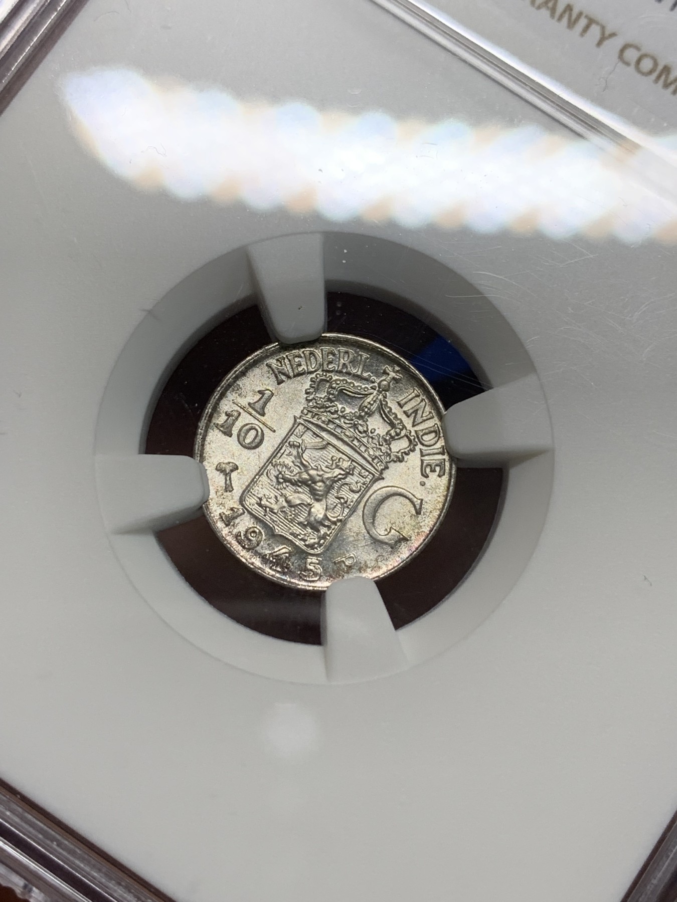 《竞宝斋》第242场-周日，周一 新年开场 (全场包邮) NGC MS66 荷属东印度群岛（今印尼）1945年1/10盾银币 高等级分数