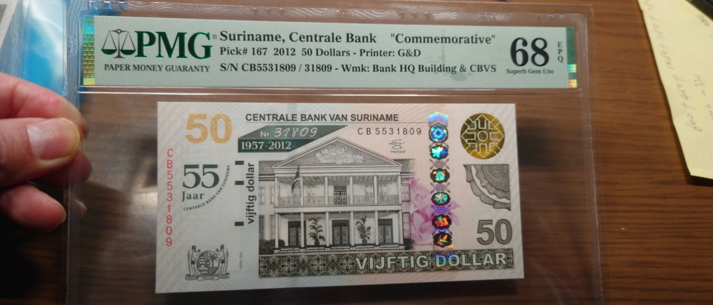 2012年苏里南50元纪念钞全程无47尾号809 PMG68E 带原册和证书- 世界 
