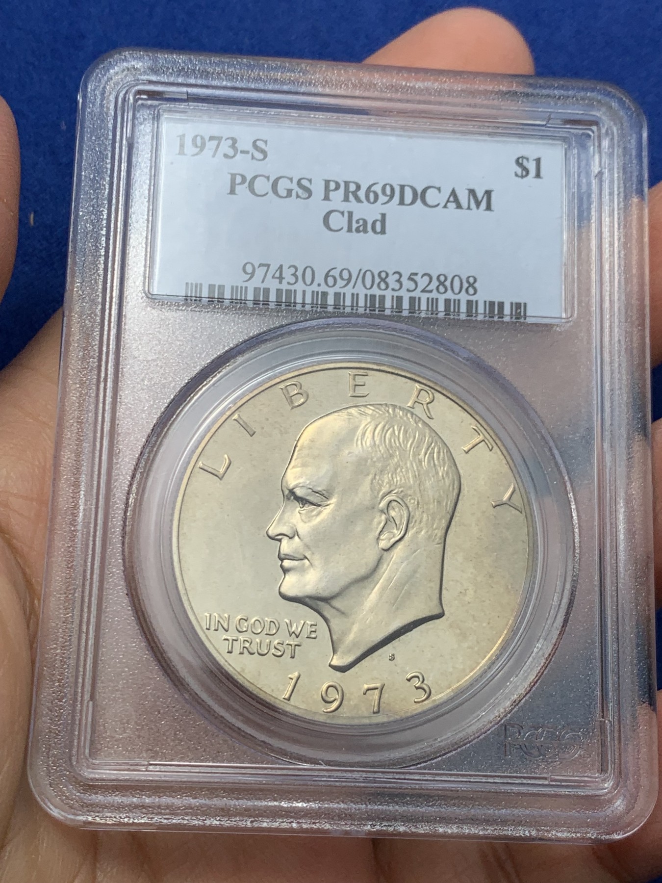 《竞宝斋》第242场-周日，周一 新年开场 (全场包邮) PCGS-PR69DCAM 1973年美国艾森豪威尔1美元精制币，直径38mm，重22.8克，状态极佳，PC早期经典小白盒老盒无官网图，更高评级数量55枚。