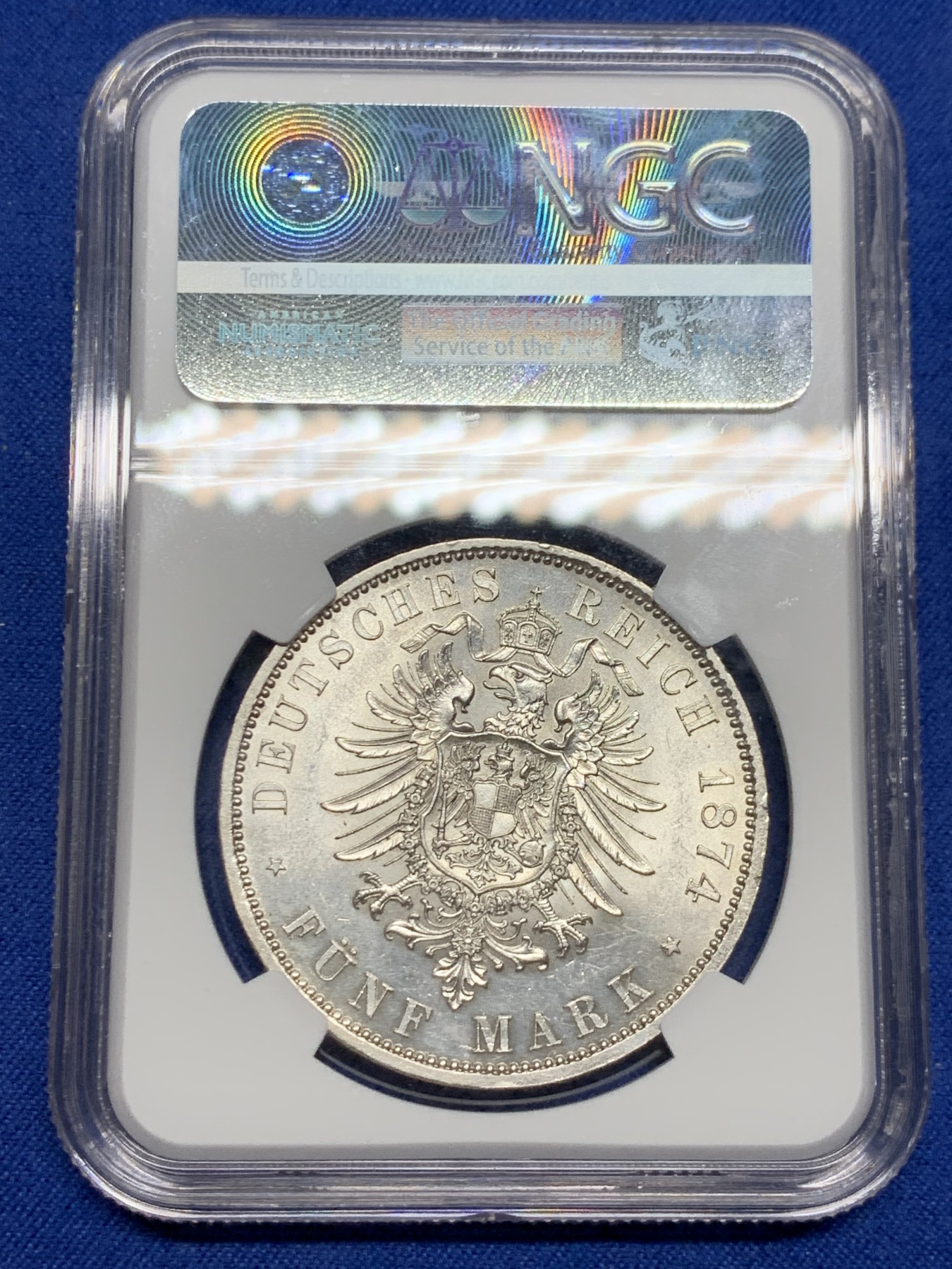 《竞宝斋》第242场-周日，周一 新年开场 (全场包邮) NGC MS61 德国1874年首年普鲁士威廉一世短翅5马克银币 曝光车轮转光流通马克中的经典威一短翅好品极难 感觉低评