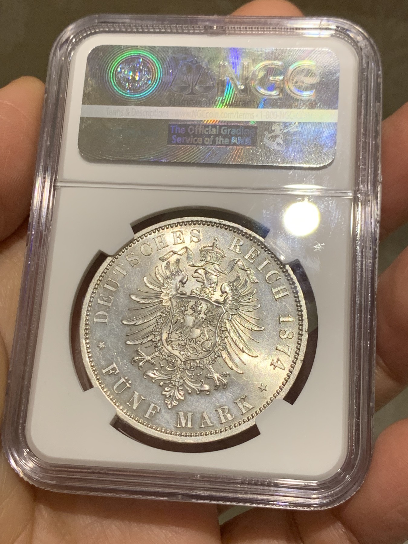 《竞宝斋》第242场-周日，周一 新年开场 (全场包邮) NGC MS61 德国1874年首年普鲁士威廉一世短翅5马克银币 曝光车轮转光流通马克中的经典威一短翅好品极难 感觉低评