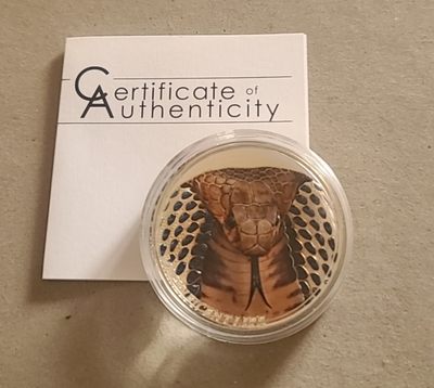 【币将精彩】世界钱币拍卖拍卖（2026-4-22） 库克2017年自然光彩之眼镜蛇弧面异彩银币带证书包装