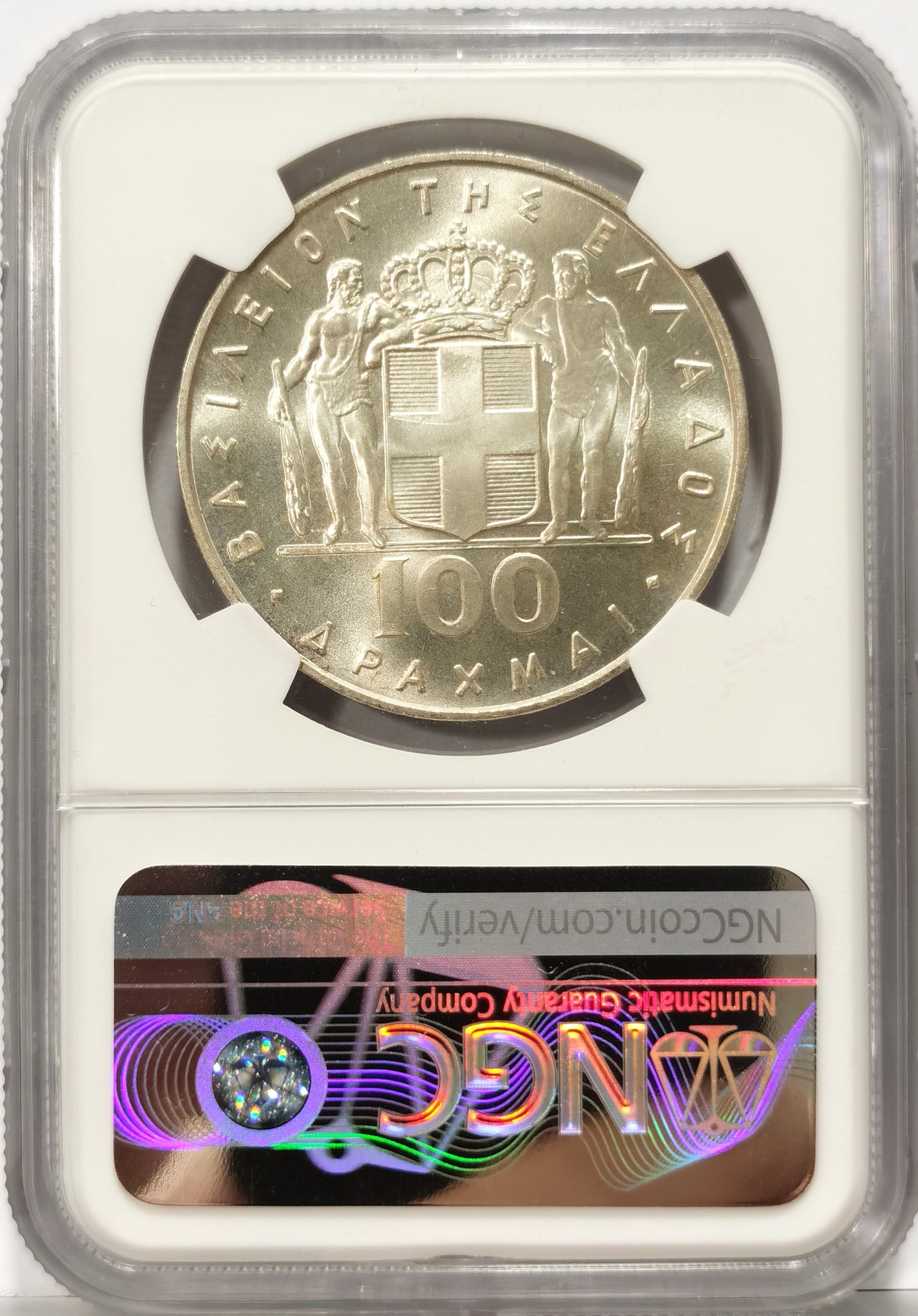 博洋堂世界钱币拍卖第066期（全场包邮） 希腊1967年军政府火凤凰100德拉克马银币NGC-MS65，直径37mm，重25g，900银,发行量3万枚，实际于1970年发行。原汁原味老包浆，包浆醇厚，打制精美，币面清爽干净又漂亮，状态极佳。希腊军政府又称上校政权是1967年-1974年统治希腊的右翼军事独裁政权。其统治始于1967年4月21日清晨希腊军方发动政变，终于1974年7月24日，历时7年