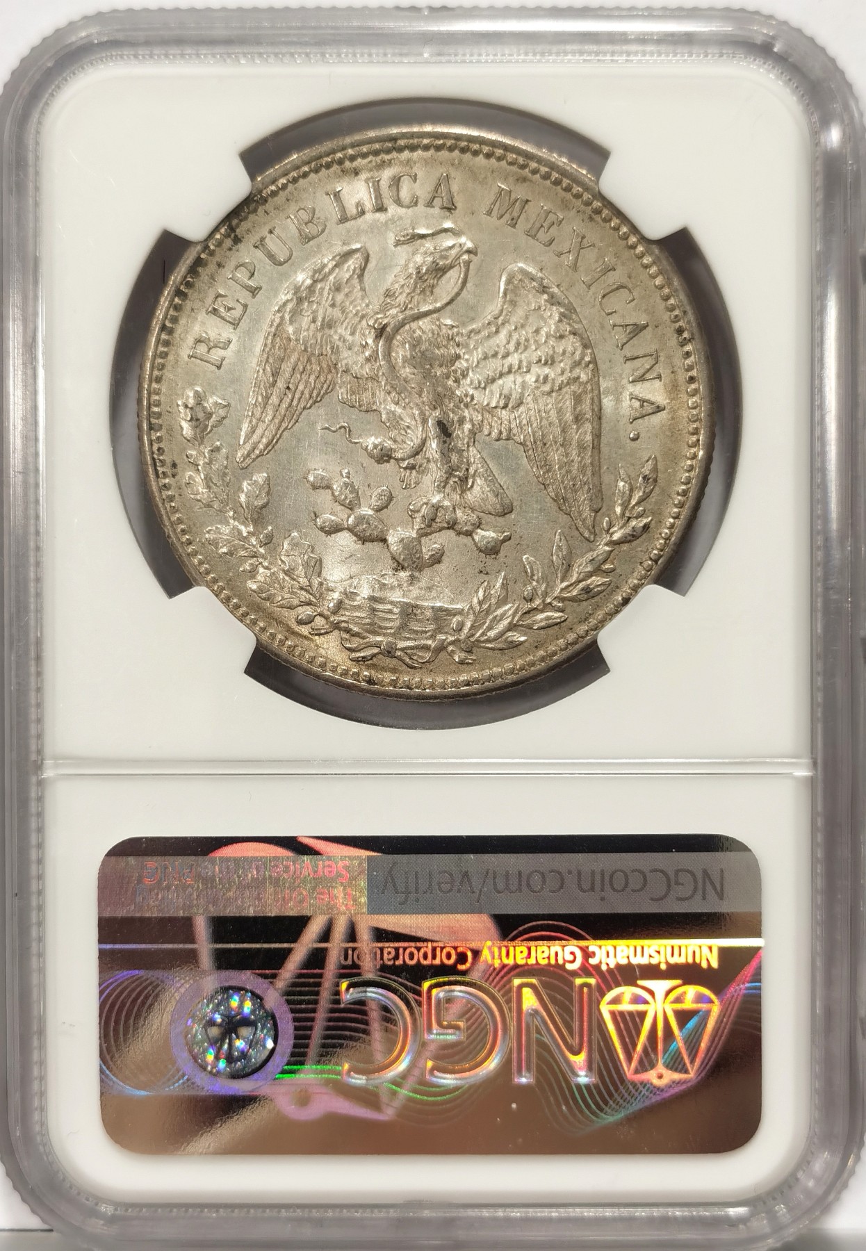 博洋堂世界钱币拍卖第066期（全场包邮） 1909年墨西哥MO GV直边鹰洋1比索银币NGC-MS62，直边鹰洋关门币。原汁原味老包浆，包浆醇厚，打制精美，状态极佳，获得更高的评分数目才154枚，经典潜力品种