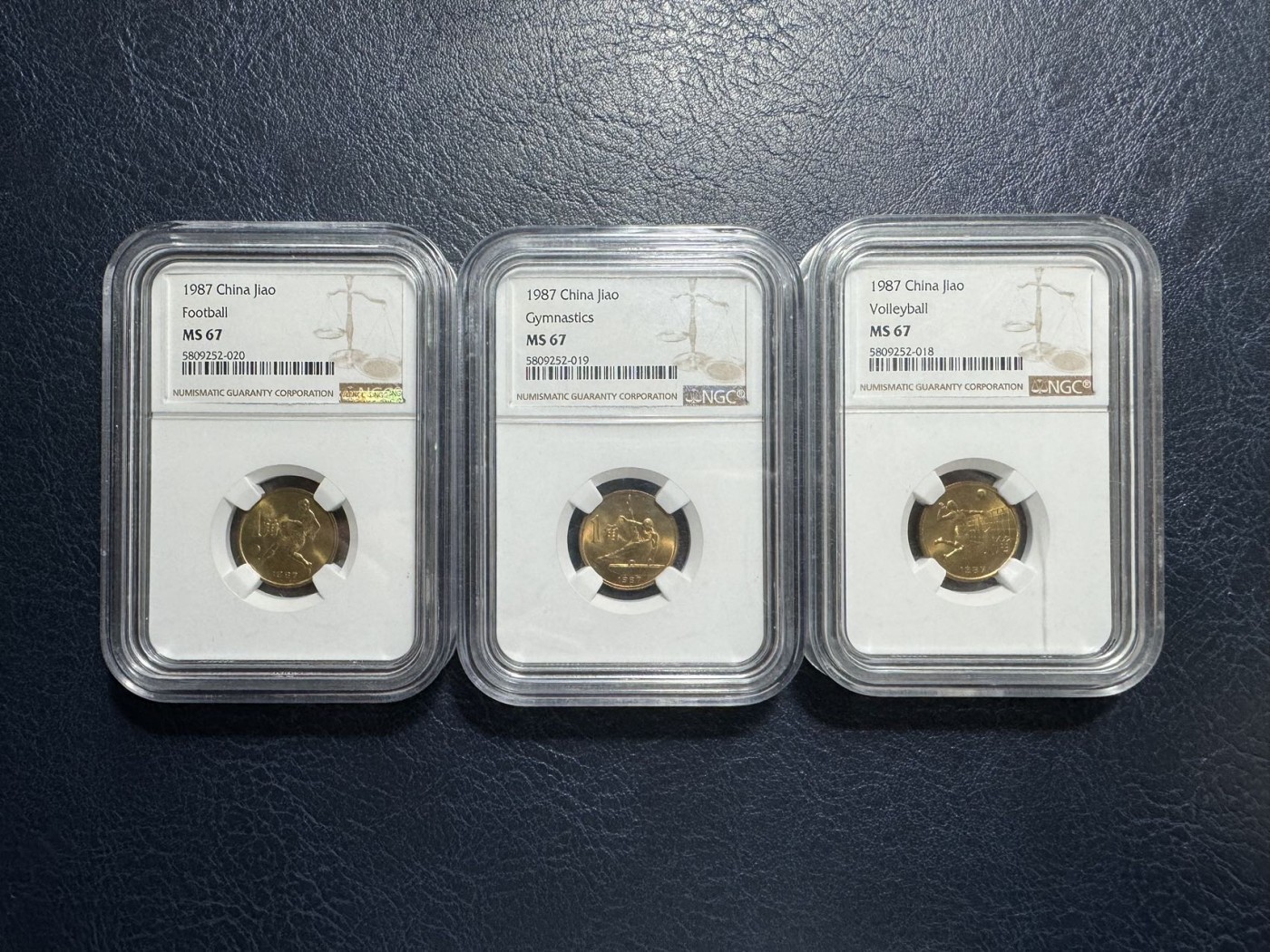 收藏联盟Quantum Auction 第327期拍卖  中国1987年第六届运动会纪念币1角三枚一套  NGC MS67 带原盒