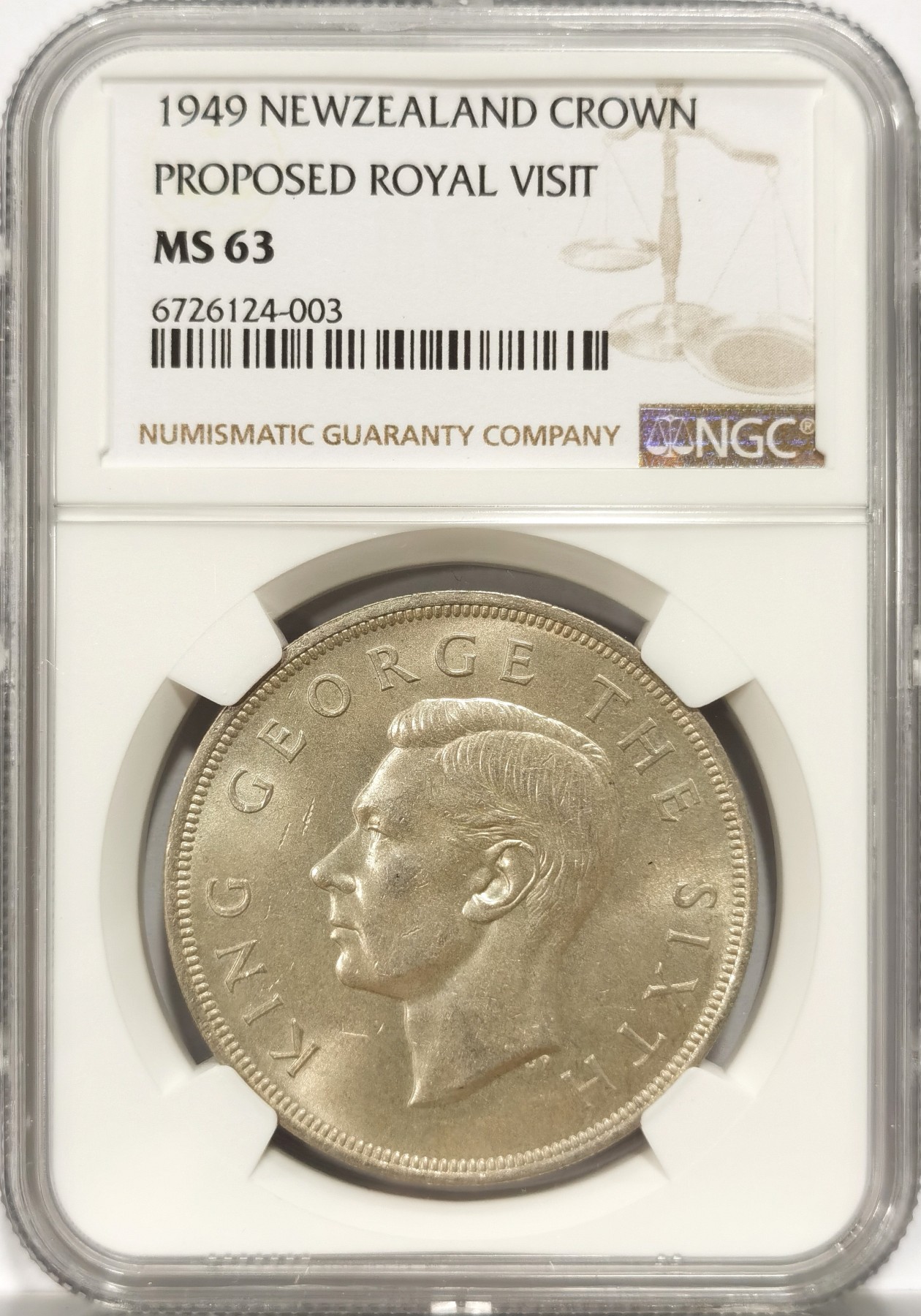 博洋堂世界钱币拍卖第066期（全场包邮） NGC MS63 1949年新西兰乔治六世克朗大银币，背面是新西兰国花银蕨。银光闪烁，光度十足，币面清爽又干净。
