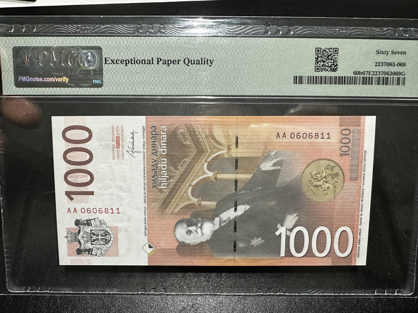 《外钞收藏家》第三百四十三期（评级场） 2014年塞尔维亚1000第纳尔 AA冠 无47 PMG67 倒置号