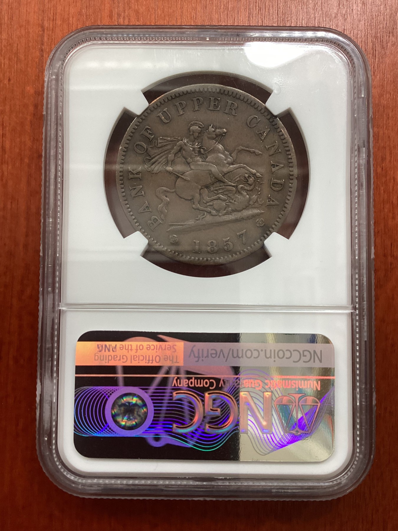 长老汇龙年精选第二场 1857 加拿大上加拿大银行1便士铜币，NGC AU53BN，背经典马剑形象