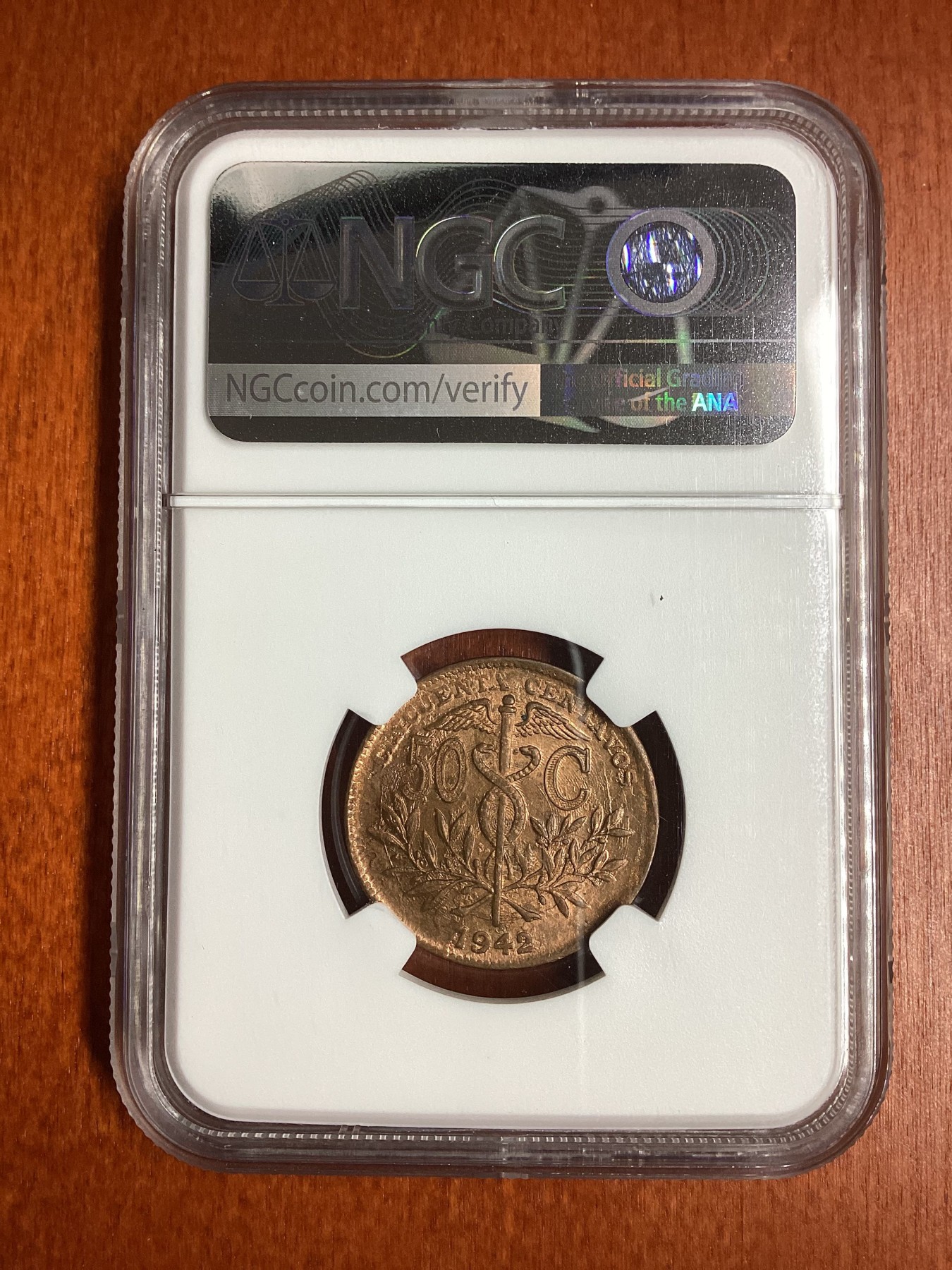 长老汇龙年精选第二场 1942 玻利维亚50分铜币，NGC MS64RB，季军分