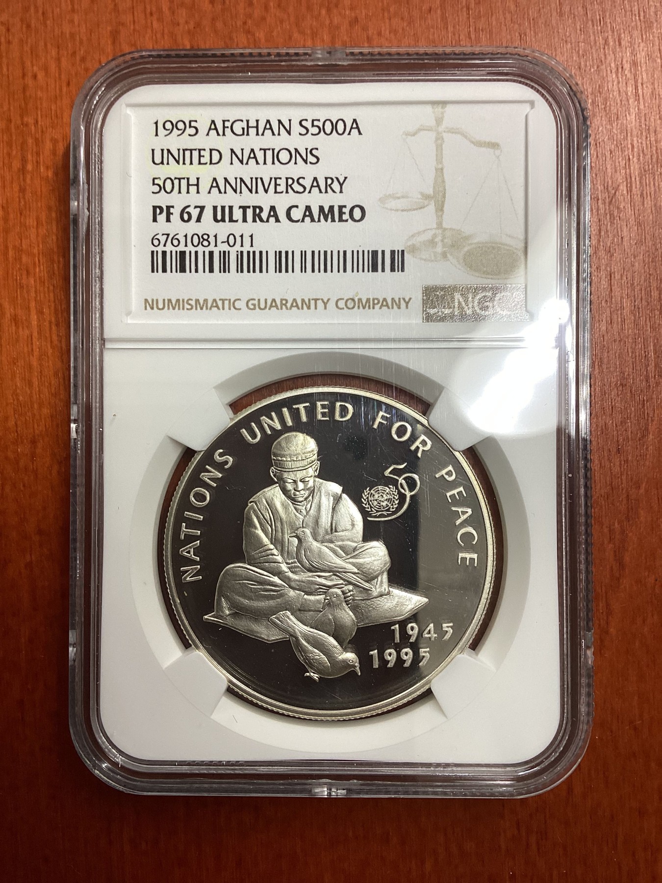长老汇龙年精选第二场 1995 阿富汗联合国成立50周年纪念500阿富汗元精制银币，NGC PF67UC，更高分仅有8枚，关于阿富汗的评级币不多