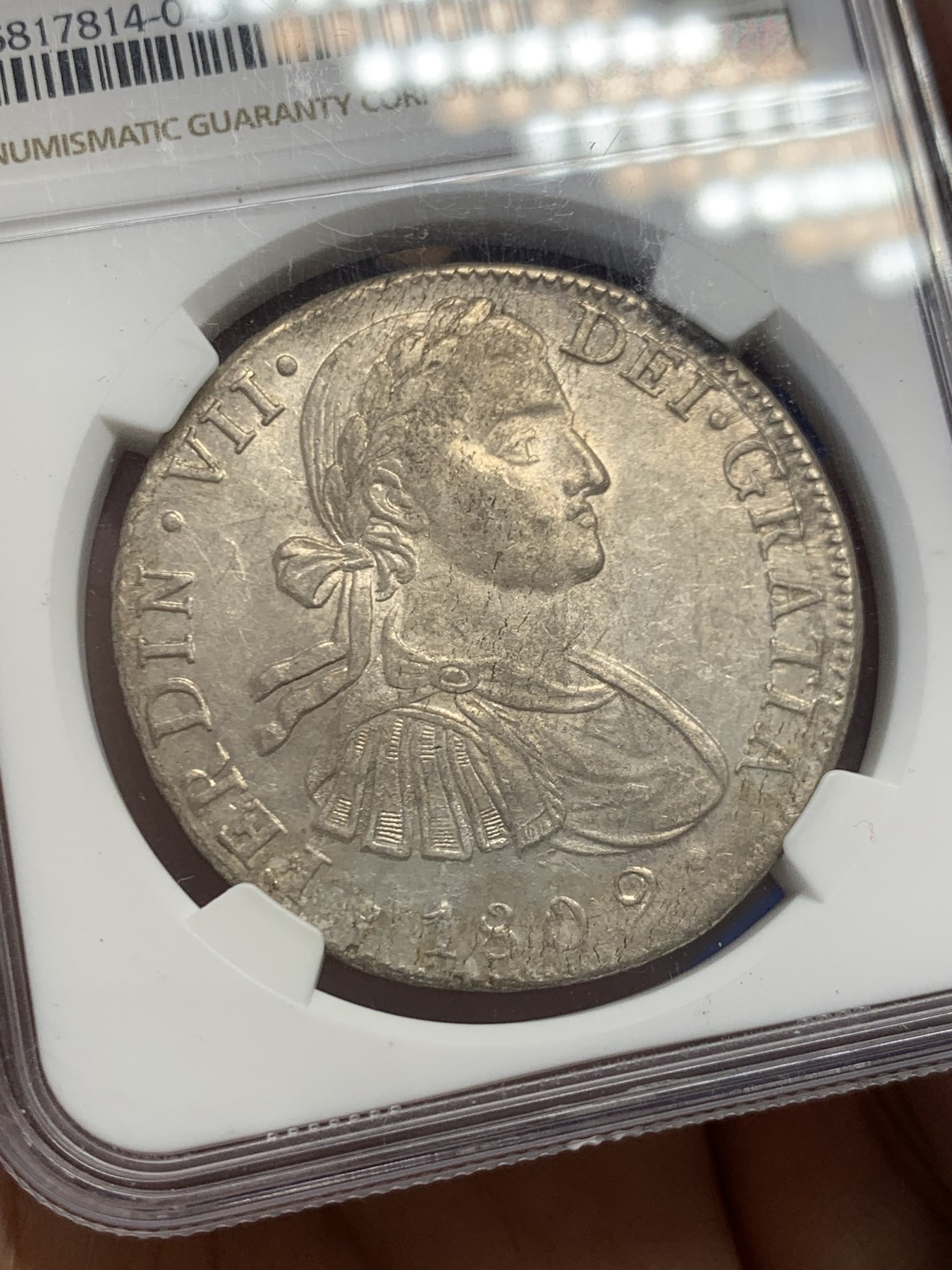 《竞宝斋》第243场-周日，周一 新年开场 (全场包邮) NGC AU58 西属墨西哥1809年费七戎装版双柱银币 全深打 细节一流 原光