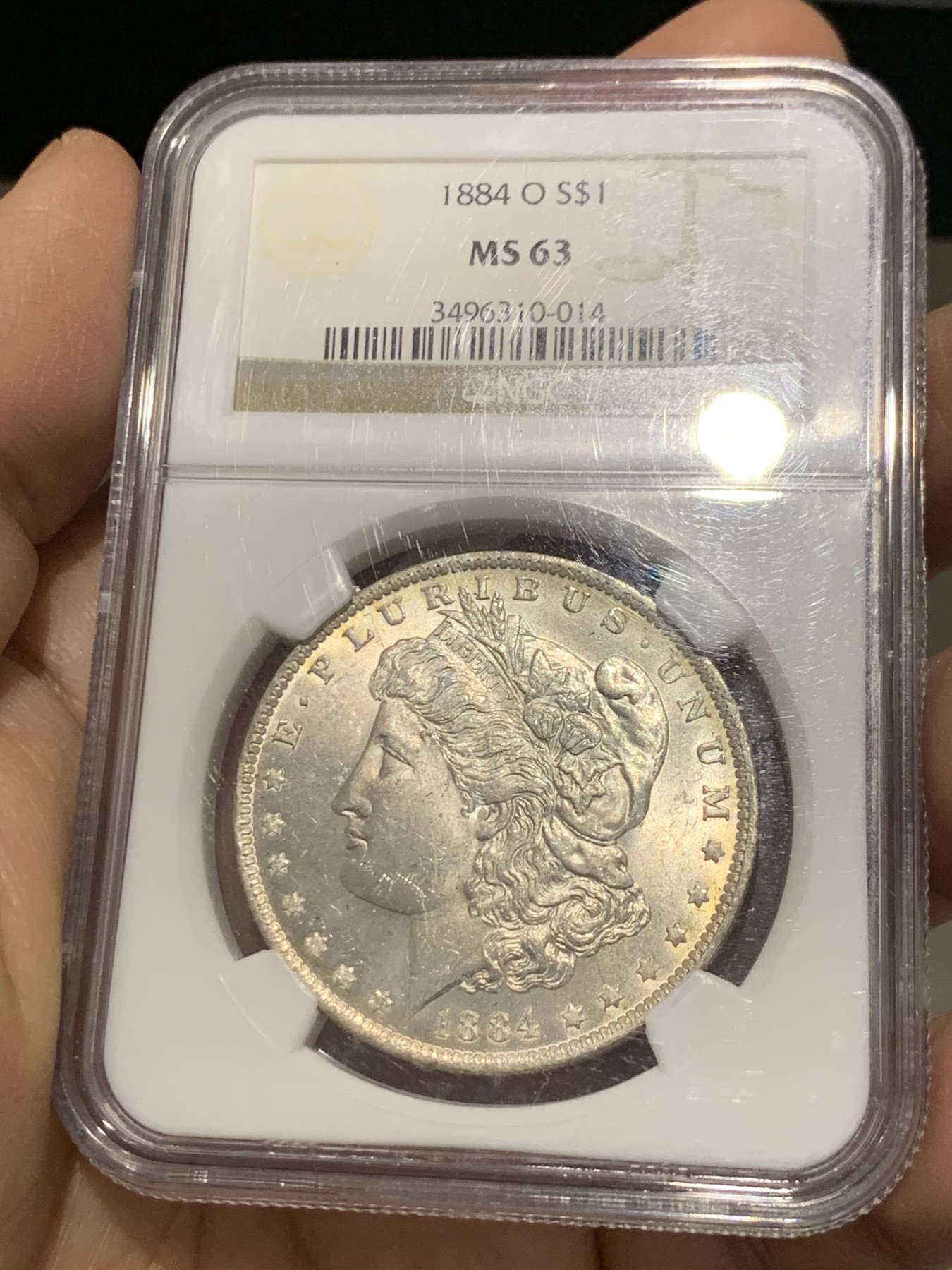 《竞宝斋》第243场-周日，周一 新年开场 (全场包邮) NGC MS63 美国1884年摩根银币 O版 淡淡黄油光 正面那道是包浆印子 不是划痕 年年上涨品种