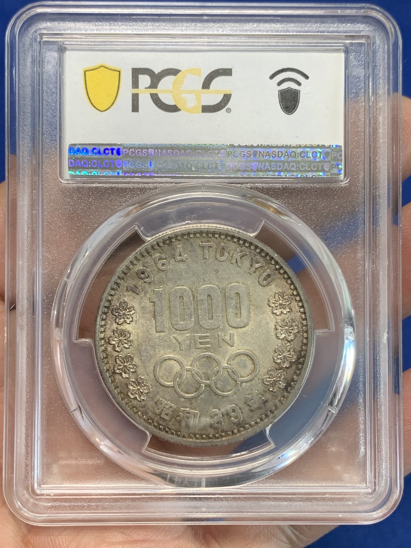 《竞宝斋》第243场-周日，周一 新年开场 (全场包邮) PCGS MS63 日本1964年东京大奥银币，色彩梦幻感强烈，非常漂亮，日本大奥幻彩银币，