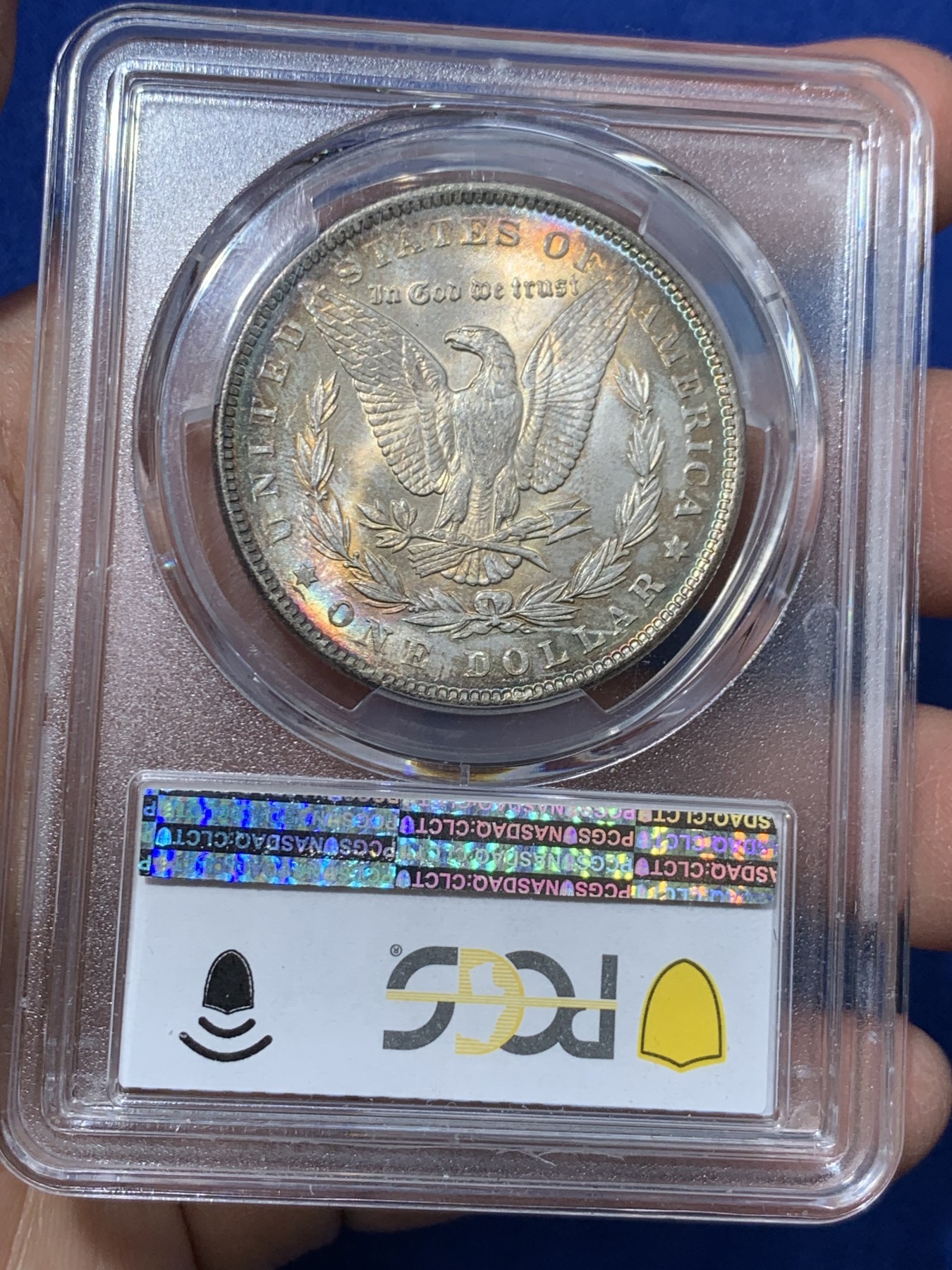 《竞宝斋》第243场-周日，周一 新年开场 (全场包邮) PCGS MS64 美国1889年摩根银币P版，极美原汁原味五彩包浆，包浆醇厚浓郁，打制精美，状态一流。币面五彩斑斓，炫耀夺目，状态和品质不输现在的65分，市场上稀少年份版本的摩根币。
