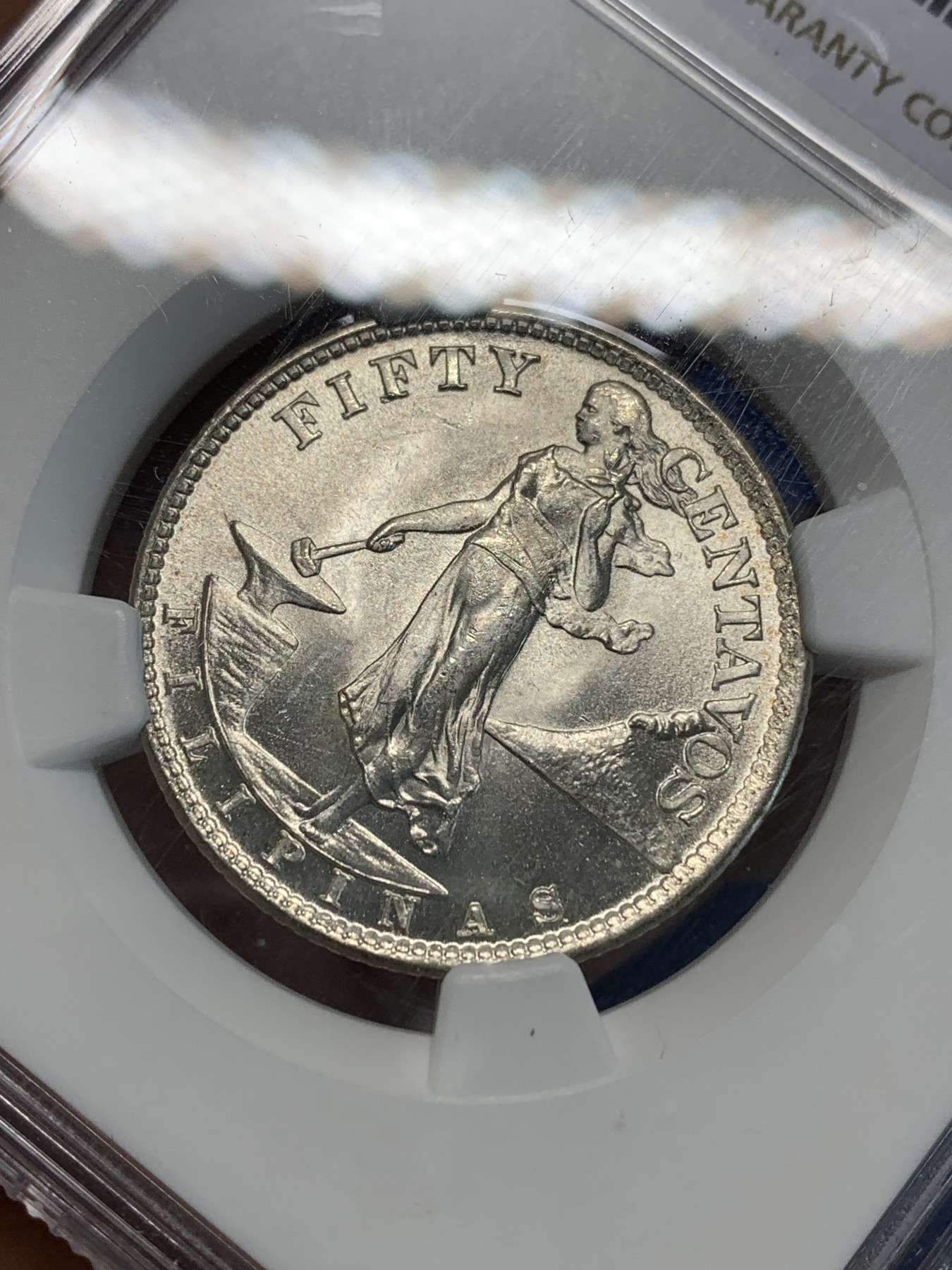 《竞宝斋》第243场-周日，周一 新年开场 (全场包邮) NGC MS63 菲律宾1945年火山飞鹰50分银币 卷拆原光 状态一流