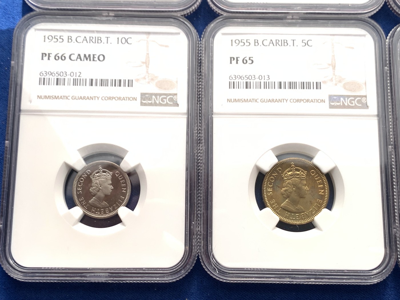 《竞宝斋》第243场-周日，周一 新年开场 (全场包邮) 1955年东加勒比7枚套，盒子连号，伊利沙白女王青年经典形象，带原盒和币商证书标签。