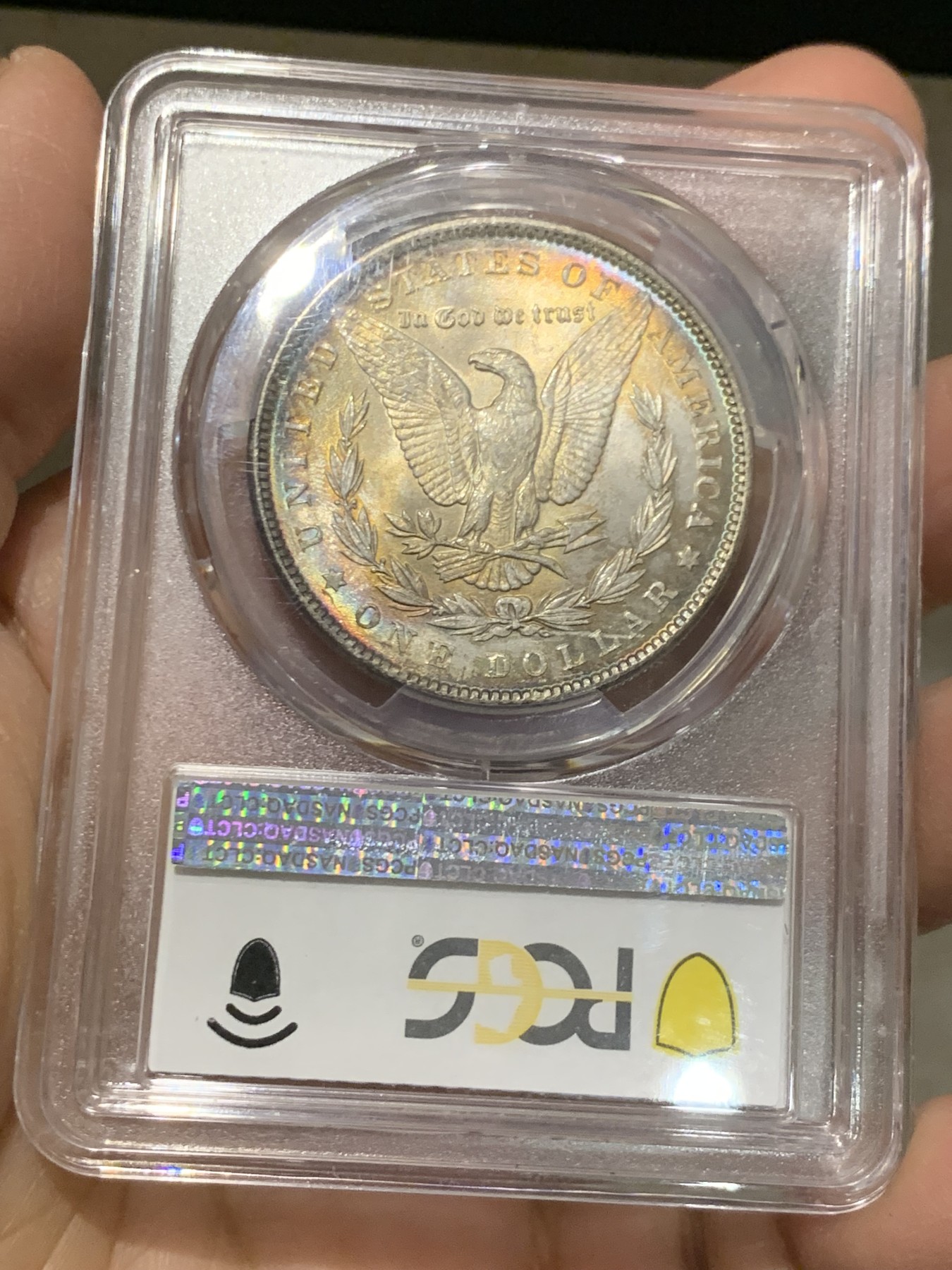 《竞宝斋》第243场-周日，周一 新年开场 (全场包邮) PCGS MS64 美国1889年摩根银币P版，极美原汁原味五彩包浆，包浆醇厚浓郁，打制精美，状态一流。币面五彩斑斓，炫耀夺目，状态和品质不输现在的65分，市场上稀少年份版本的摩根币。