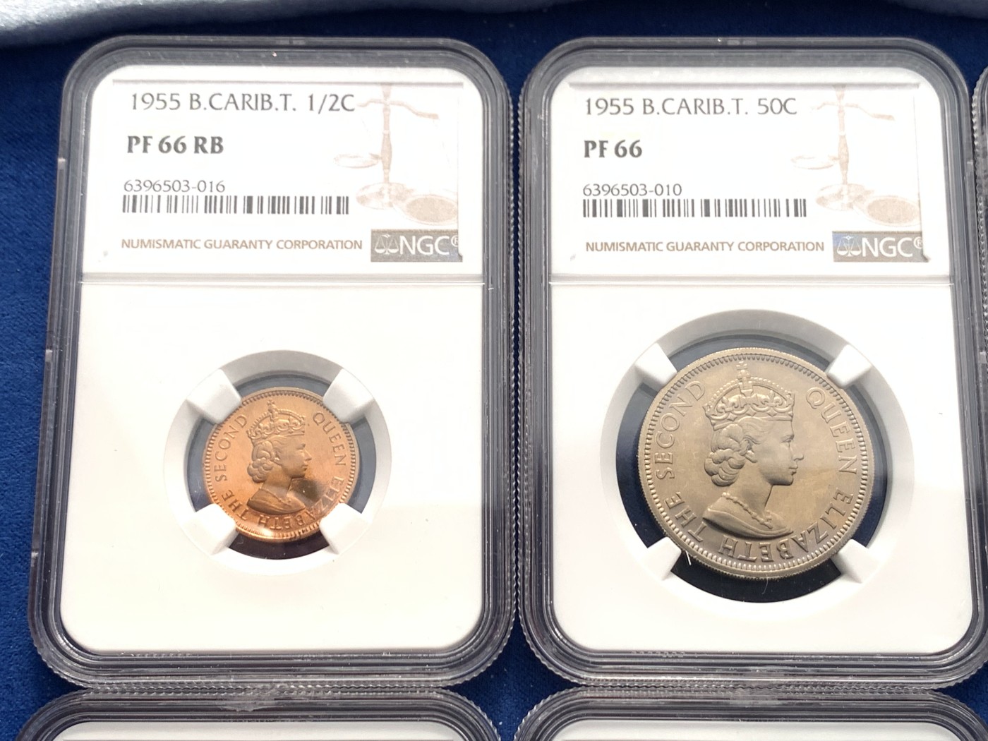 《竞宝斋》第243场-周日，周一 新年开场 (全场包邮) 1955年东加勒比7枚套，盒子连号，伊利沙白女王青年经典形象，带原盒和币商证书标签。