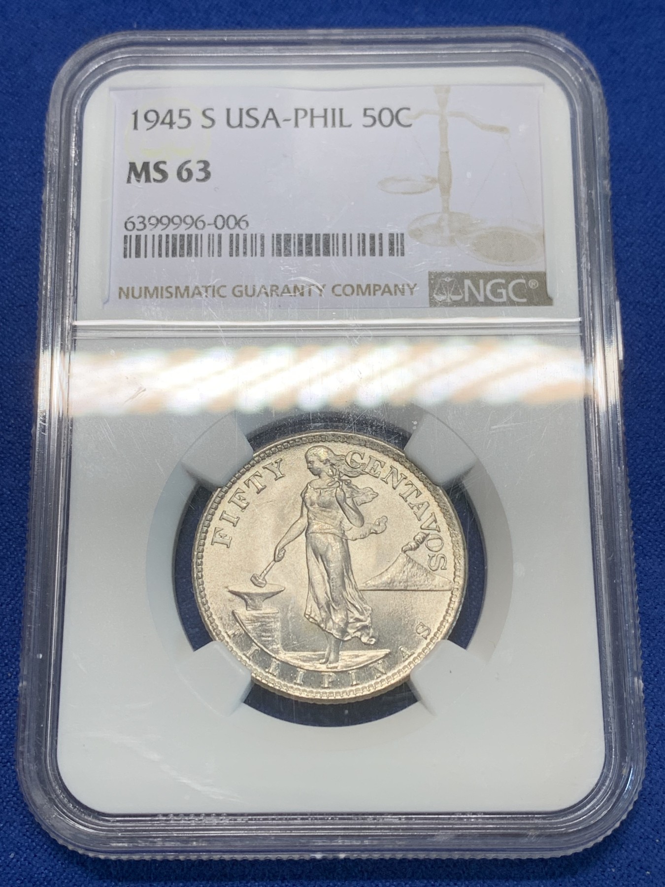 《竞宝斋》第243场-周日，周一 新年开场 (全场包邮) NGC MS63 菲律宾1945年火山飞鹰50分银币 卷拆原光 状态一流