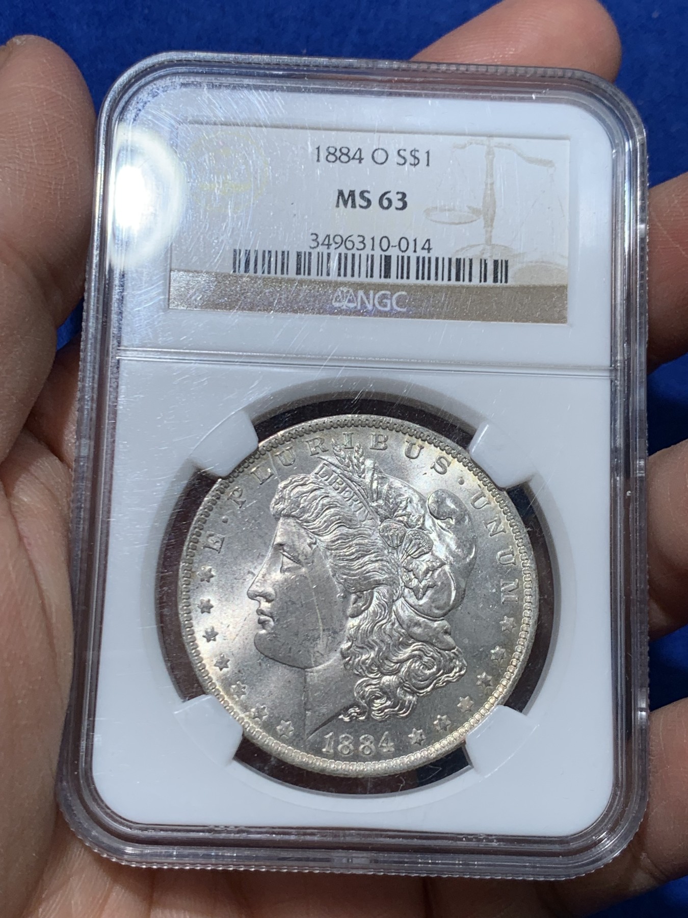 《竞宝斋》第243场-周日，周一 新年开场 (全场包邮) NGC MS63 美国1884年摩根银币 O版 淡淡黄油光 正面那道是包浆印子 不是划痕 年年上涨品种