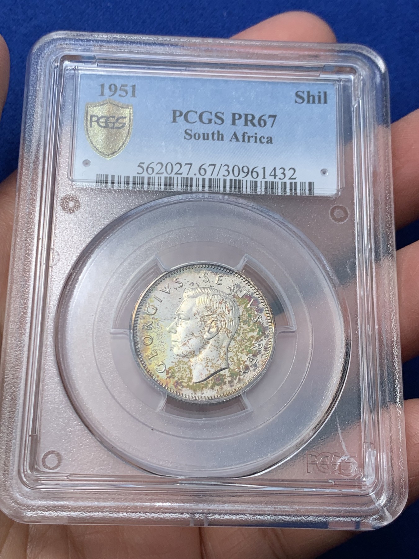 《竞宝斋》第244场-周日，周一 新年开场 (全场包邮) PCGS PR67 英属南非1951年1先令精制银币 稳亚军分 罕见超高分毕业收藏级 极美五彩包浆 盒子有损