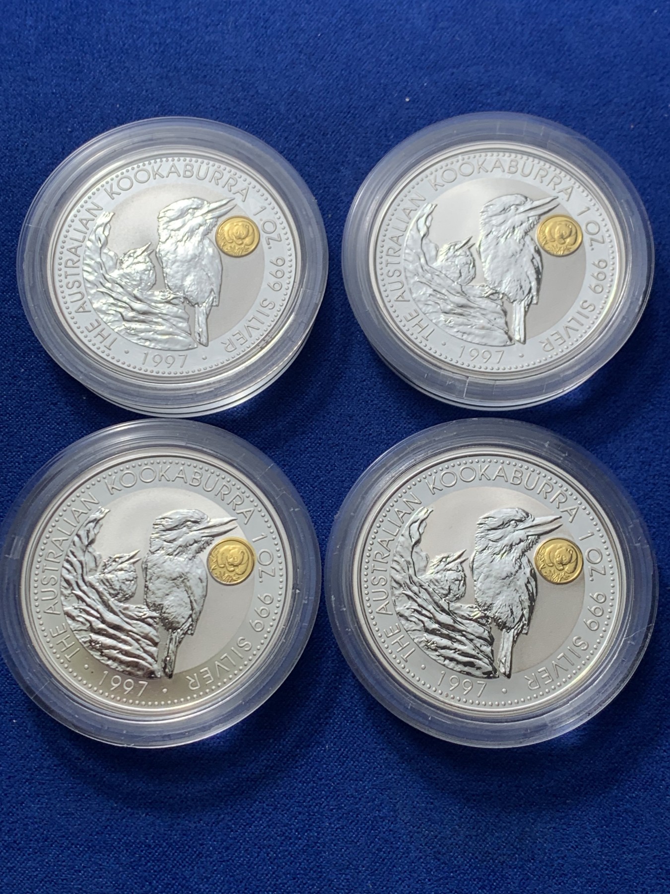 《竞宝斋》第244场-周日，周一 新年开场 (全场包邮) 4枚一组 澳大利亚 1997年 笑翠鸟 熊猫镶嵌银币 含纯银1盎司999银，金猫重0.5克黄金，发行1.5万枚，为上海国际钱币展而发行