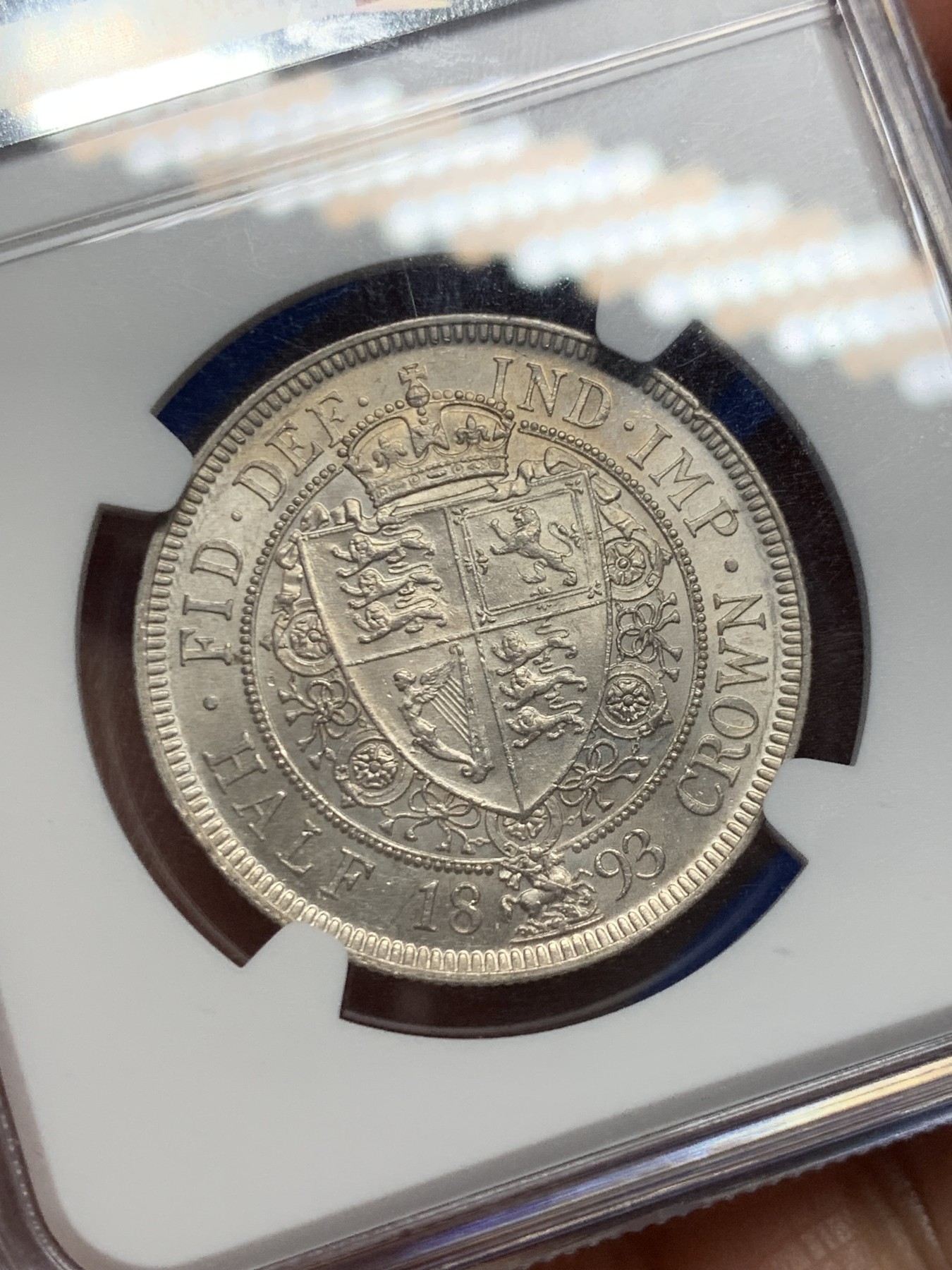 《竞宝斋》第244场-周日，周一 新年开场 (全场包邮) NGC MS62 英国1893年维多利亚披纱半克朗银币 转光好品 淡淡的黄油包浆 状态难得 低评