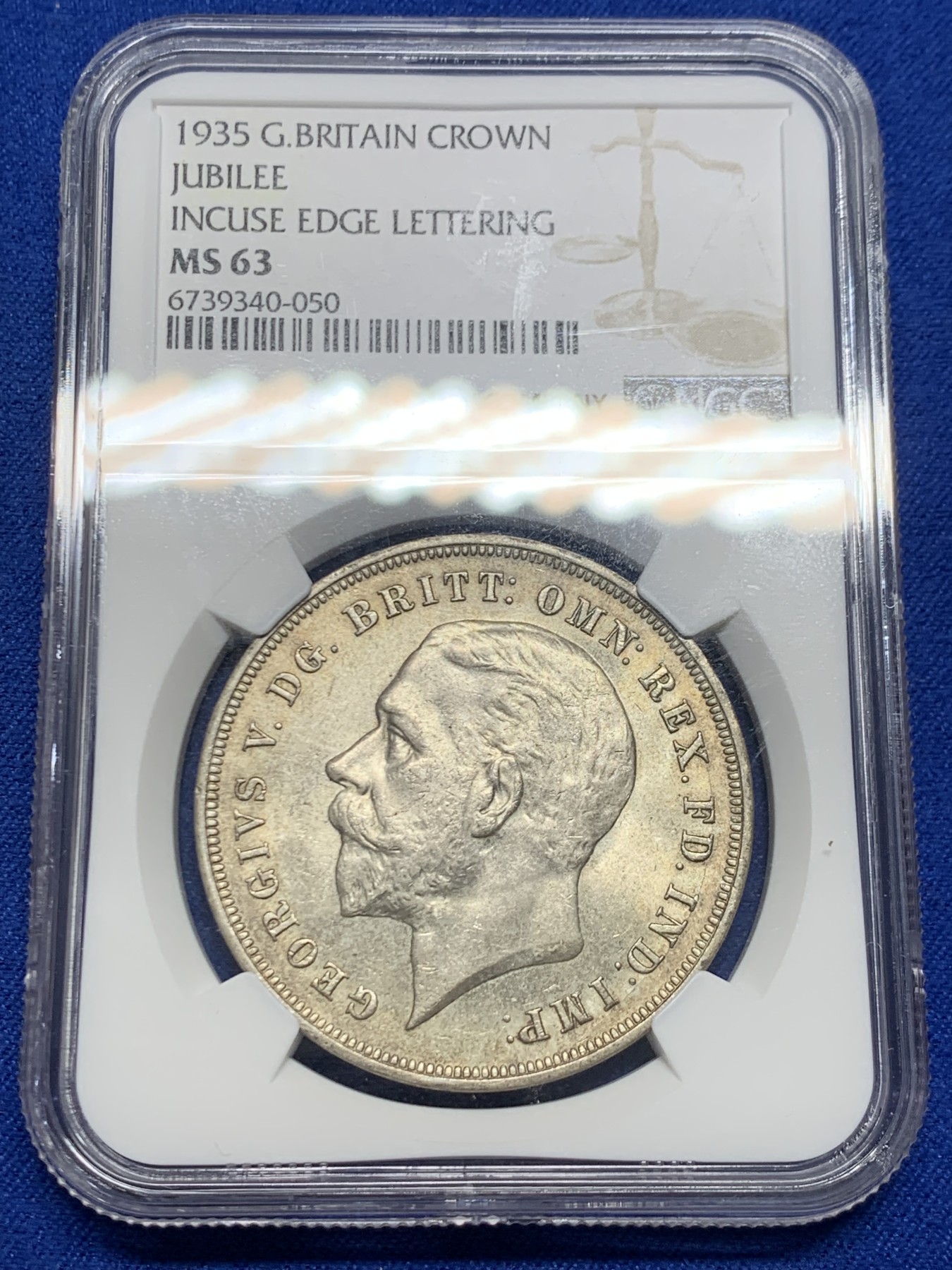 《竞宝斋》第244场-周日，周一 新年开场 (全场包邮) NGC MS63 英国 1935年 乔治五世木马马剑 1克朗 银币（唯一不同造型的马剑银币，五彩包浆浑厚大气）