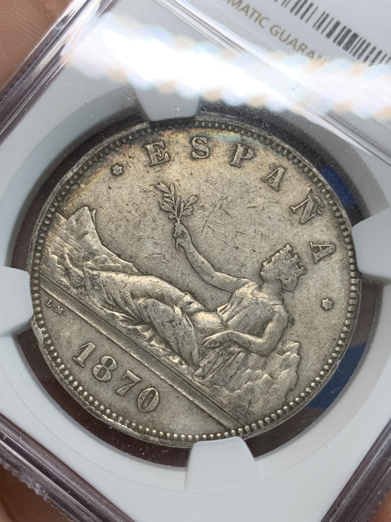 《竞宝斋》第244场-周日，周一 新年开场 (全场包邮) NGC XF40 西班牙1870年坐人拿花5比塞塔双柱大银币