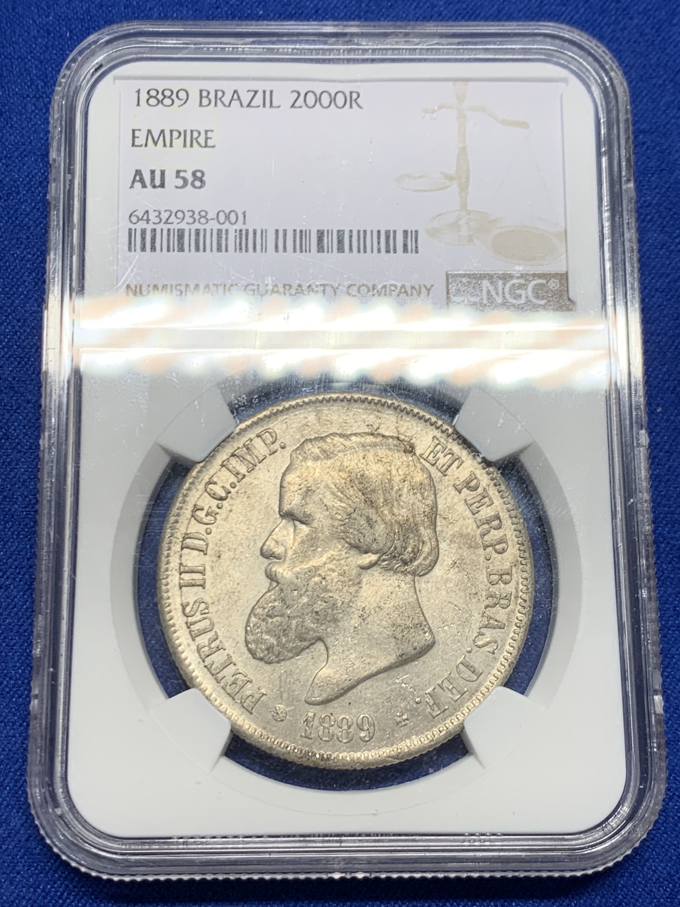 《竞宝斋》第244场-周日，周一 新年开场 (全场包邮) NGC AU58 巴西帝国1889年佩德罗二世2000瑞斯银币，原味老包浆，底板带光，值得收藏。