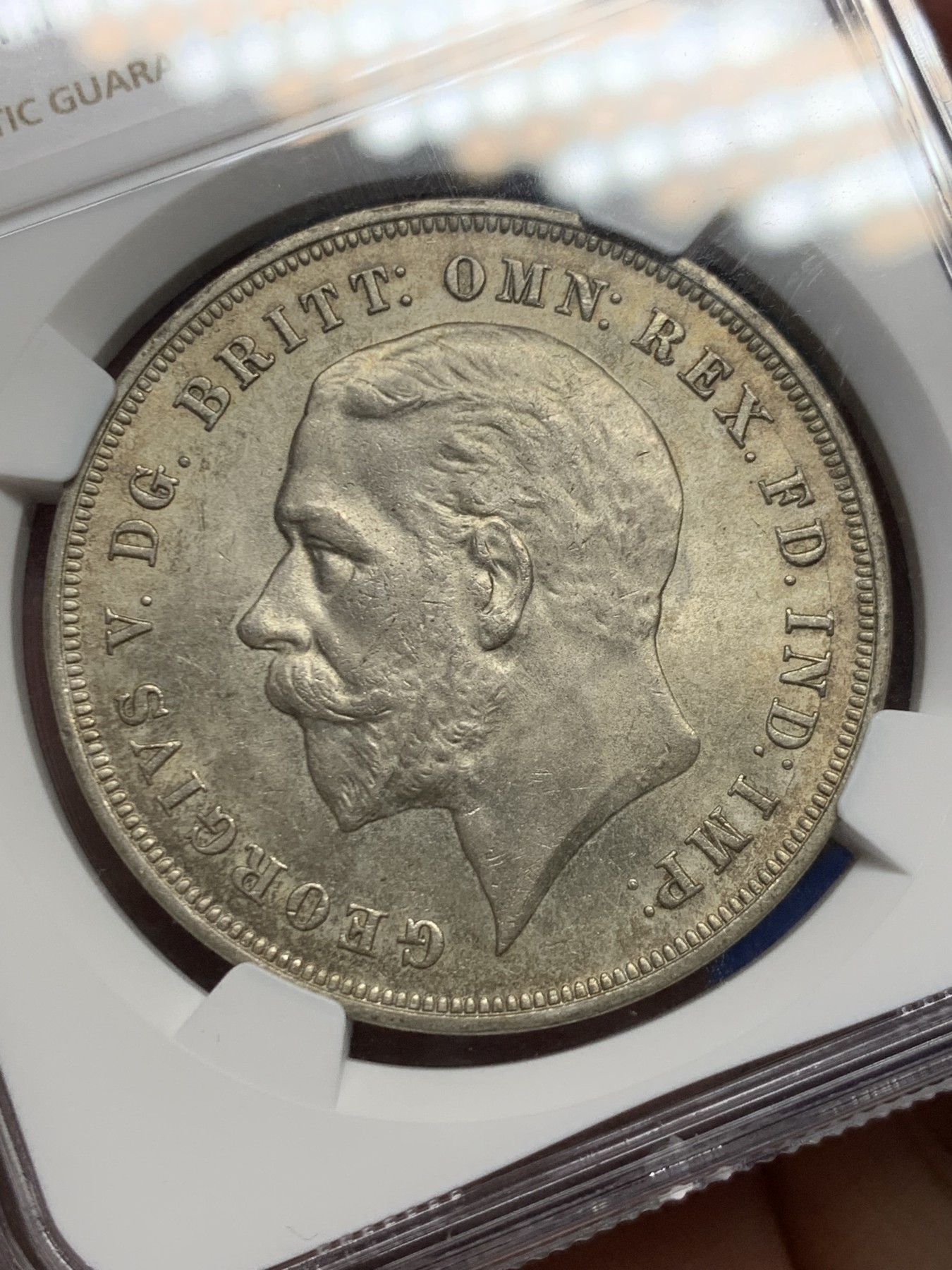 《竞宝斋》第244场-周日，周一 新年开场 (全场包邮) NGC MS63 英国 1935年 乔治五世木马马剑 1克朗 银币（唯一不同造型的马剑银币，五彩包浆浑厚大气）