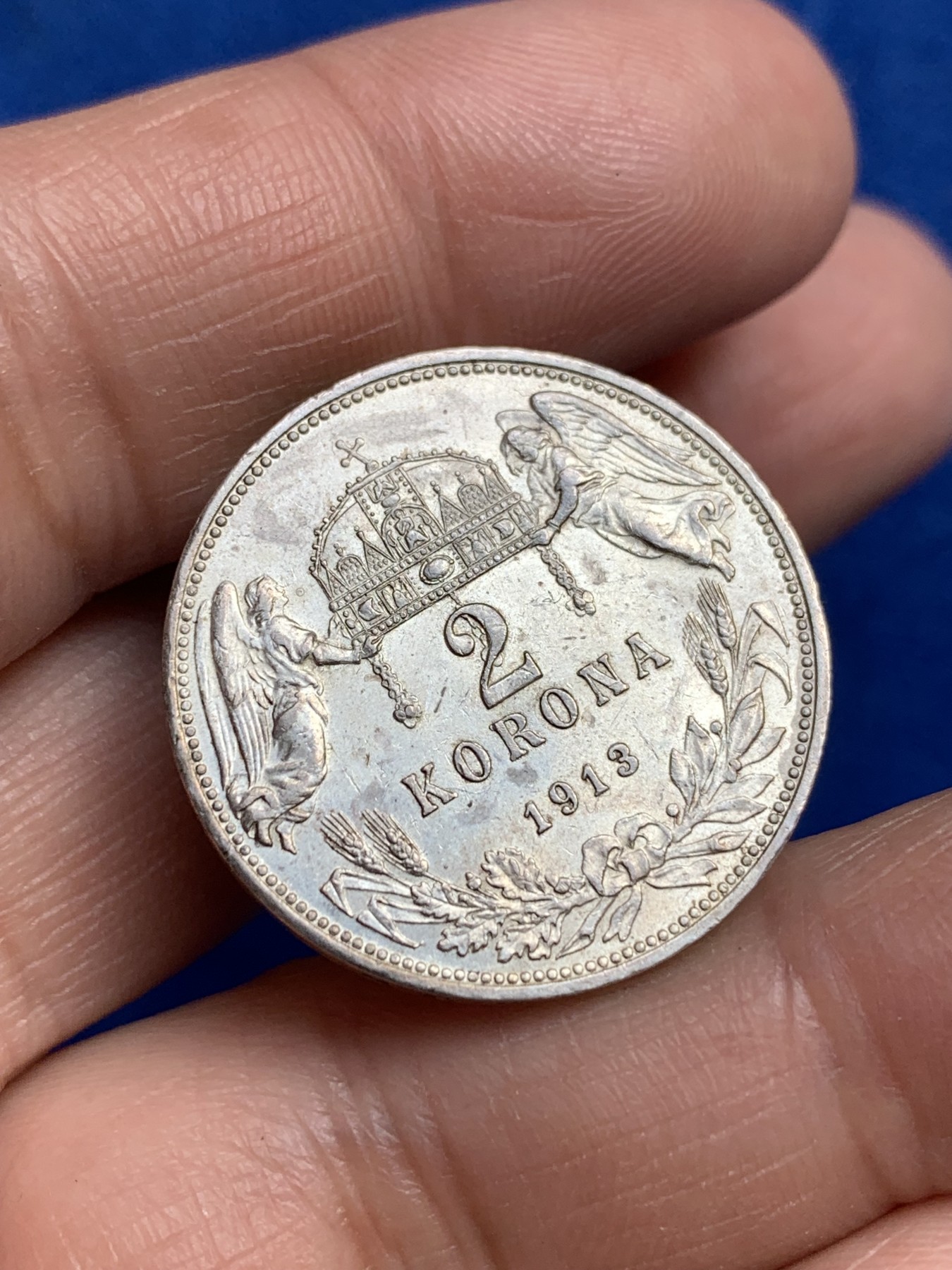 《竞宝斋》第244场-周日，周一 新年开场 (全场包邮) 1913年奥匈帝国奥地利2克朗银币 双天使 未流通状态原光强烈 状态不错 不多见的品种