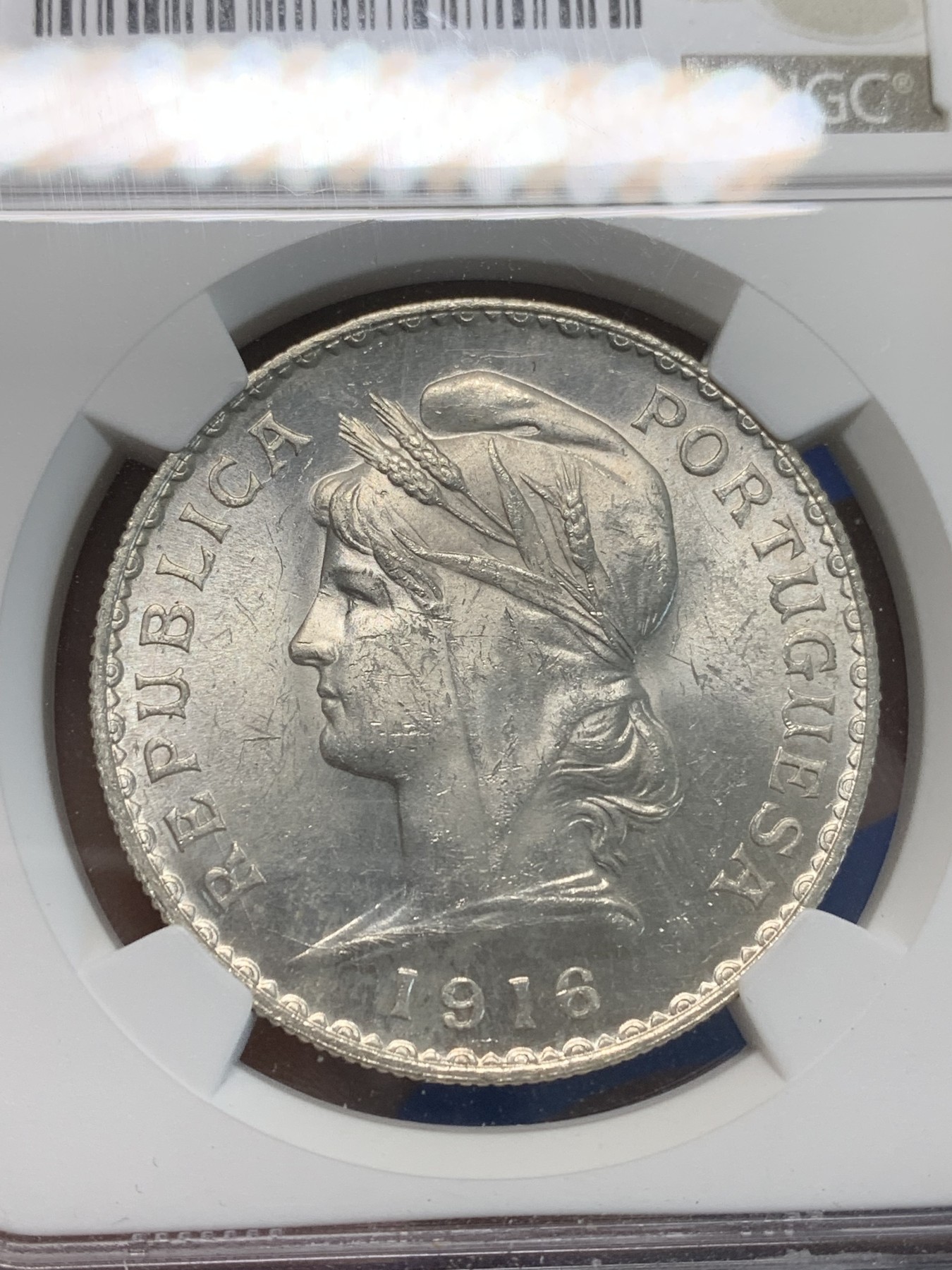 《竞宝斋》第244场-周日，周一 新年开场 (全场包邮) NGC MS62 原光葡萄牙1916年女神1埃斯库多银币