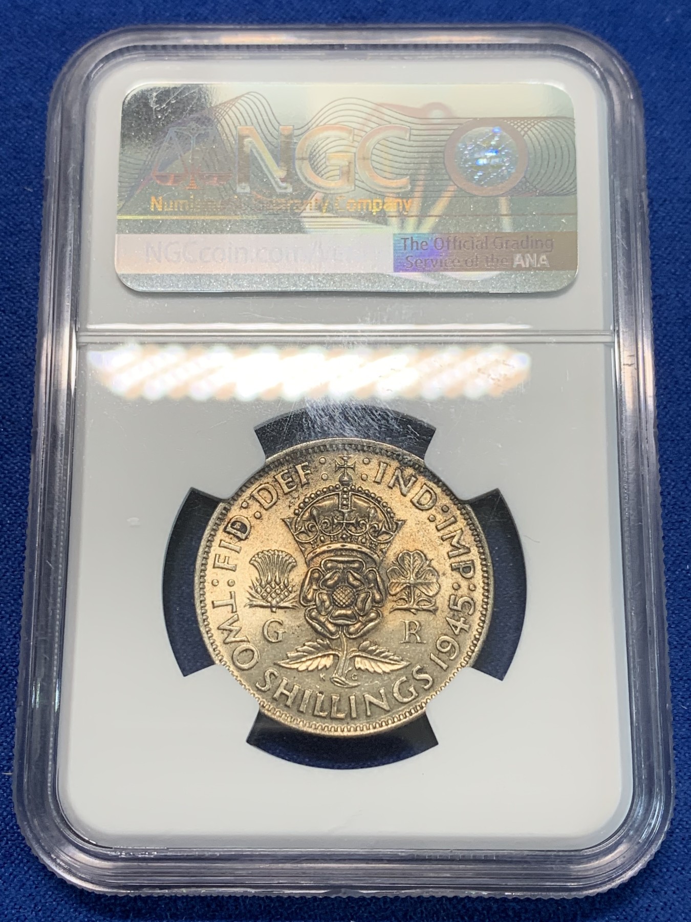 《竞宝斋》第244场-周日，周一 新年开场 (全场包邮) NGC MS62 英国1945年乔治六世2先令银币 原光五彩 状态一流