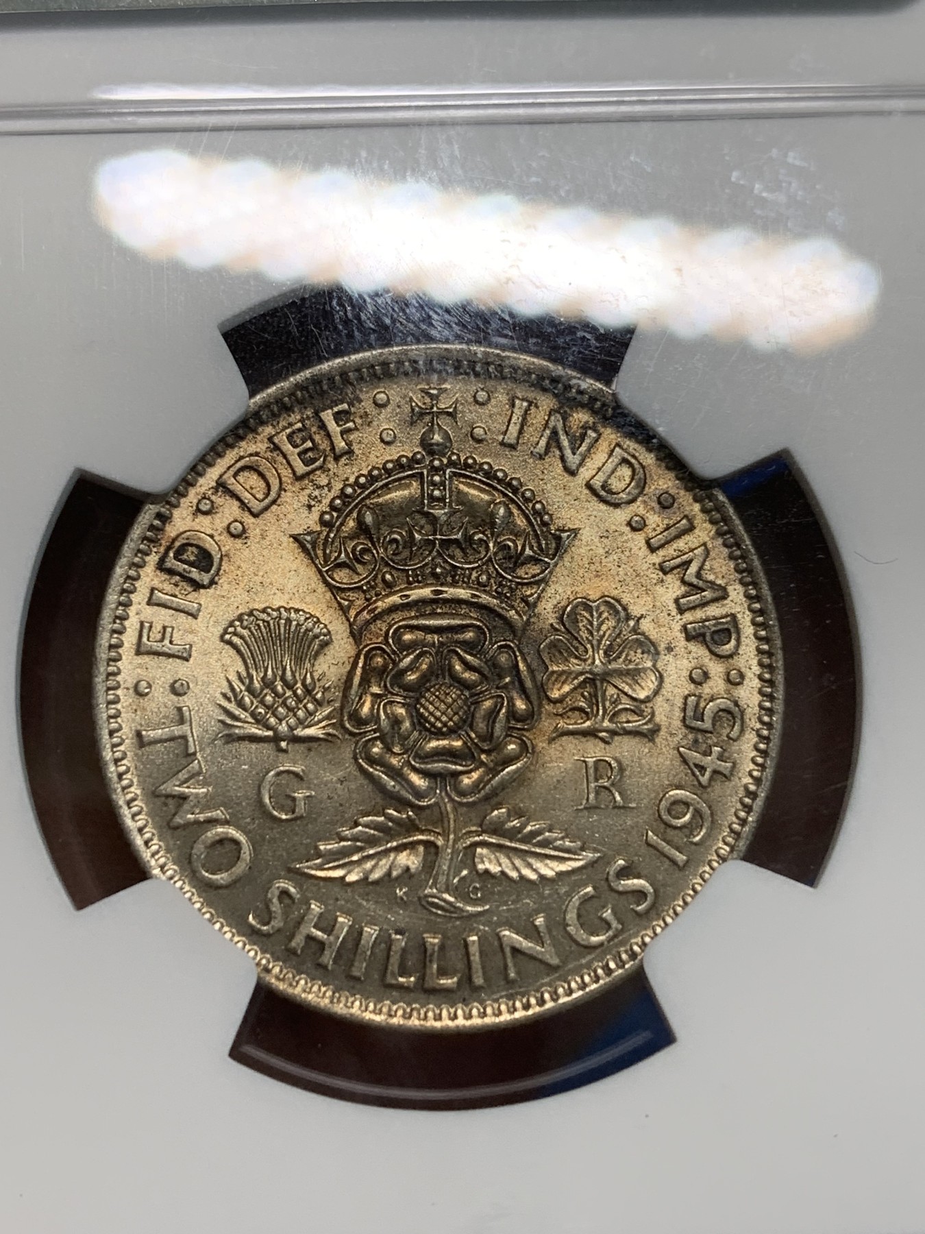 《竞宝斋》第244场-周日，周一 新年开场 (全场包邮) NGC MS62 英国1945年乔治六世2先令银币 原光五彩 状态一流