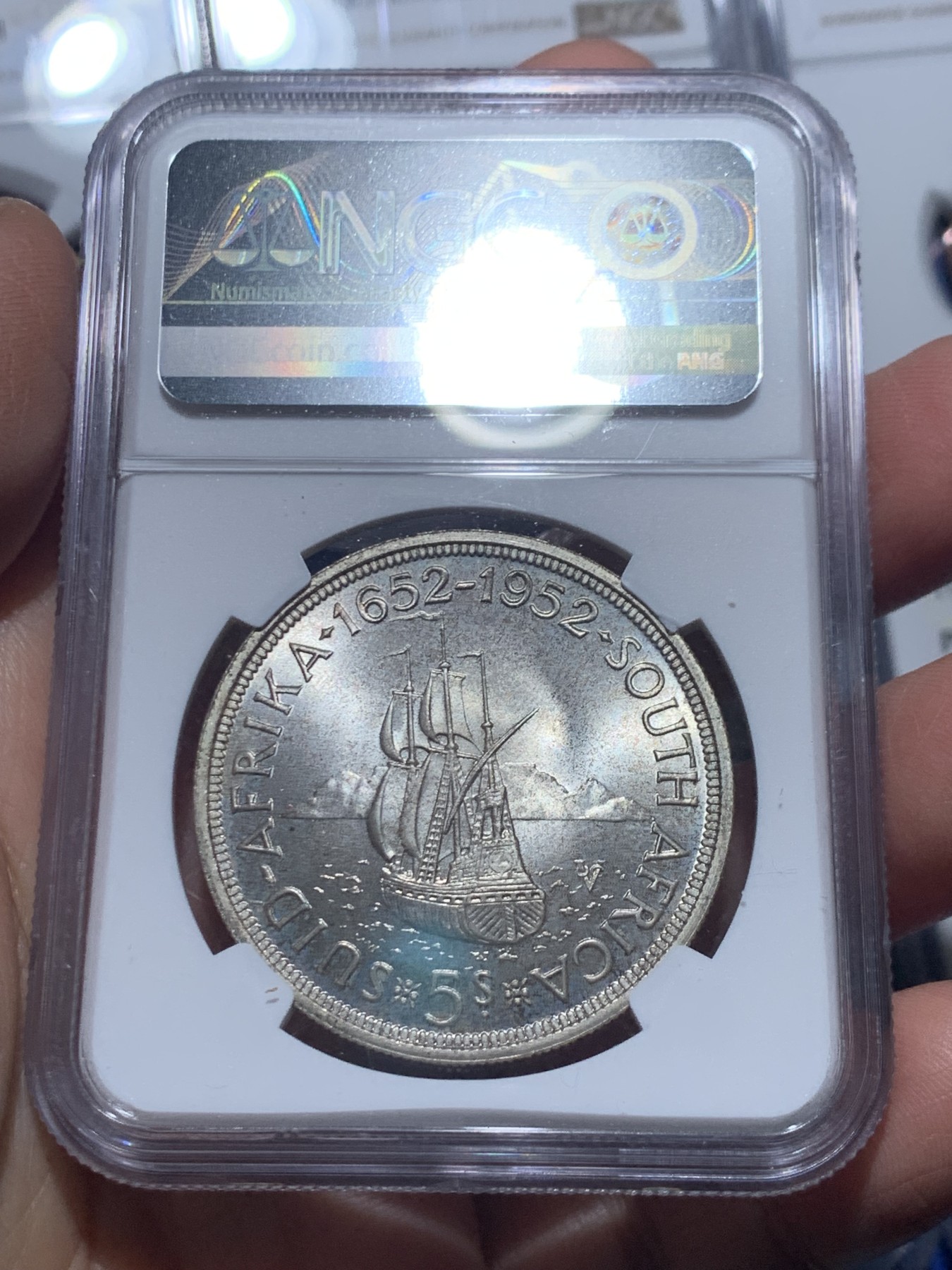 《竞宝斋》第244场-周日，周一 新年开场 (全场包邮) 1952年南非精制9枚套，原味五彩，主币高分，NGC盒子连号，带原盒。