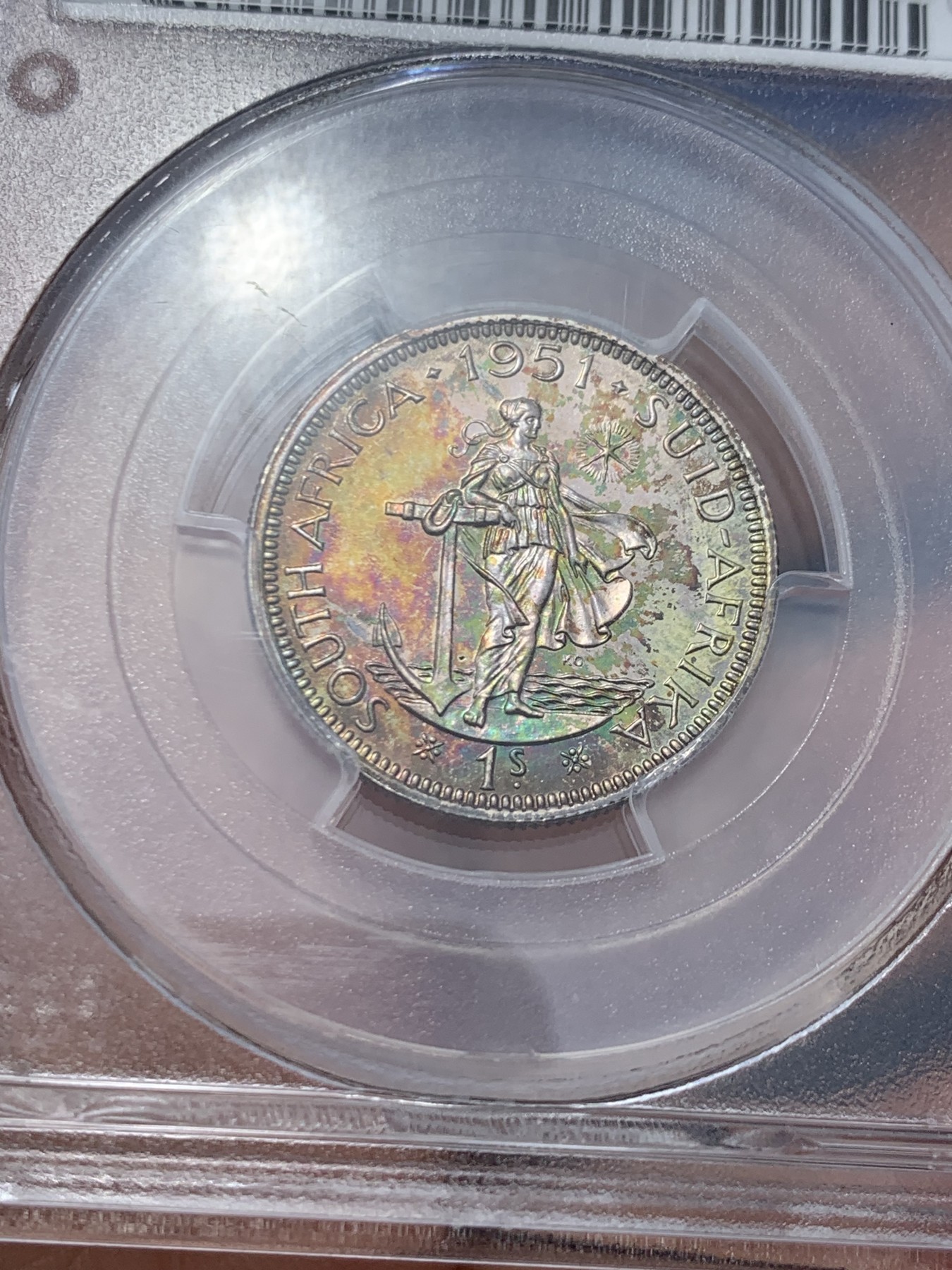 《竞宝斋》第244场-周日，周一 新年开场 (全场包邮) PCGS PR67 英属南非1951年1先令精制银币 稳亚军分 罕见超高分毕业收藏级 极美五彩包浆 盒子有损