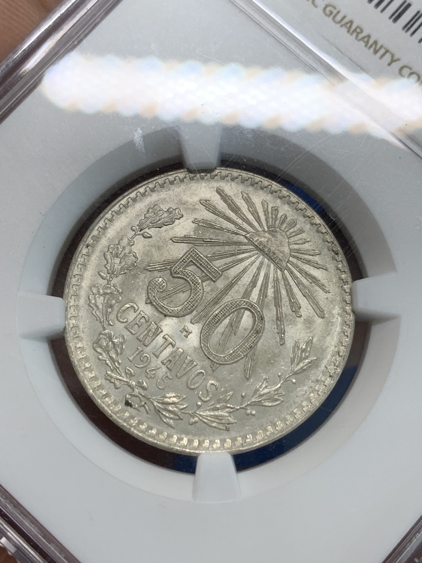 《竞宝斋》第244场-周日，周一 新年开场 (全场包邮) NGC MS66 墨西哥1945年鹰洋50分银币 币面凝霜十分养眼 高分难得 值得入手