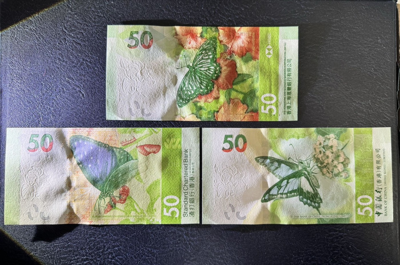 收藏联盟Quantum Auction 第328期拍卖  香港中国银行，渣打，汇丰三行2018-21年50元尾三同豹子号一组 品相全新UNC 号码无4