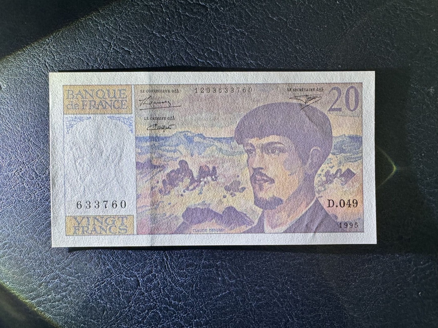 收藏联盟Quantum Auction 第328期拍卖  法国1995年20法郎 品相UNC  票面有个点钞痕 号码无4 音乐家 彪西德