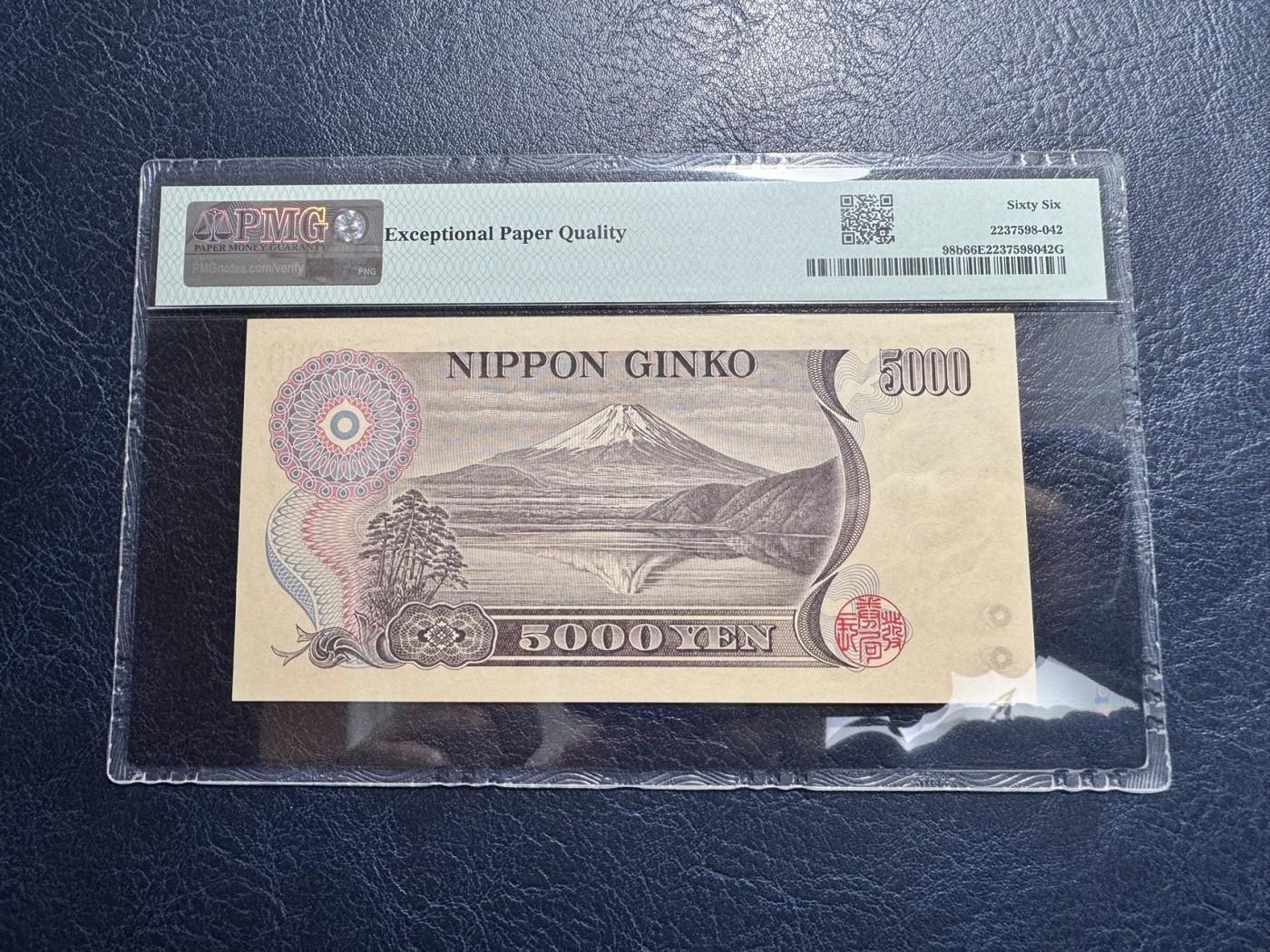 收藏联盟Quantum Auction 第328期拍卖  日本ND (1984-93)年5000日元老虎号 PMG66 几乎全同号 教育家 东京女子大学创始人之一 新渡户稻造