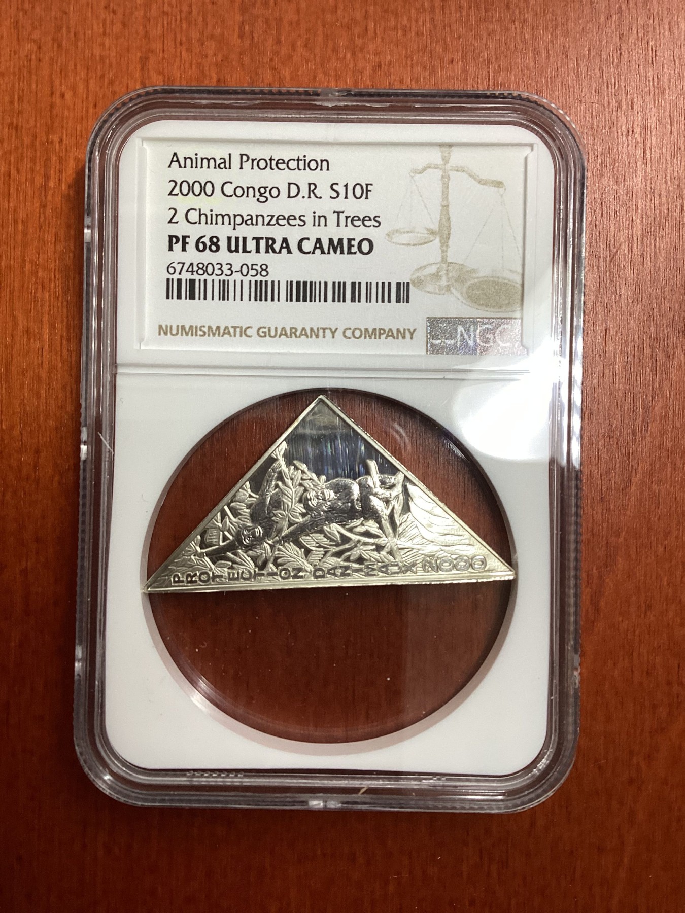 长老汇龙年精选第二场 2000 刚果动物保护系列树上的大猩猩10法郎精制三角形银币，NGC PF68UC，唯一冠军分