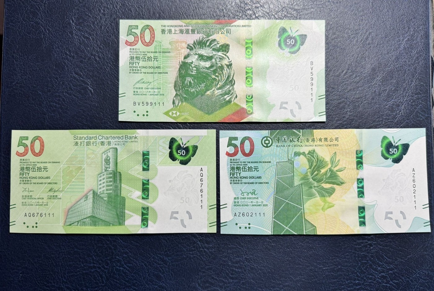 收藏联盟Quantum Auction 第328期拍卖  香港中国银行，渣打，汇丰三行2018-21年50元尾三同豹子号一组 品相全新UNC 号码无4