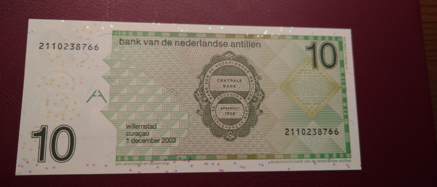 【世界钱币】精选微拍第95期暨2024年第六期 评级币裸钞场 2003年荷属安地列斯群岛10元 全新绝品无4尾号766