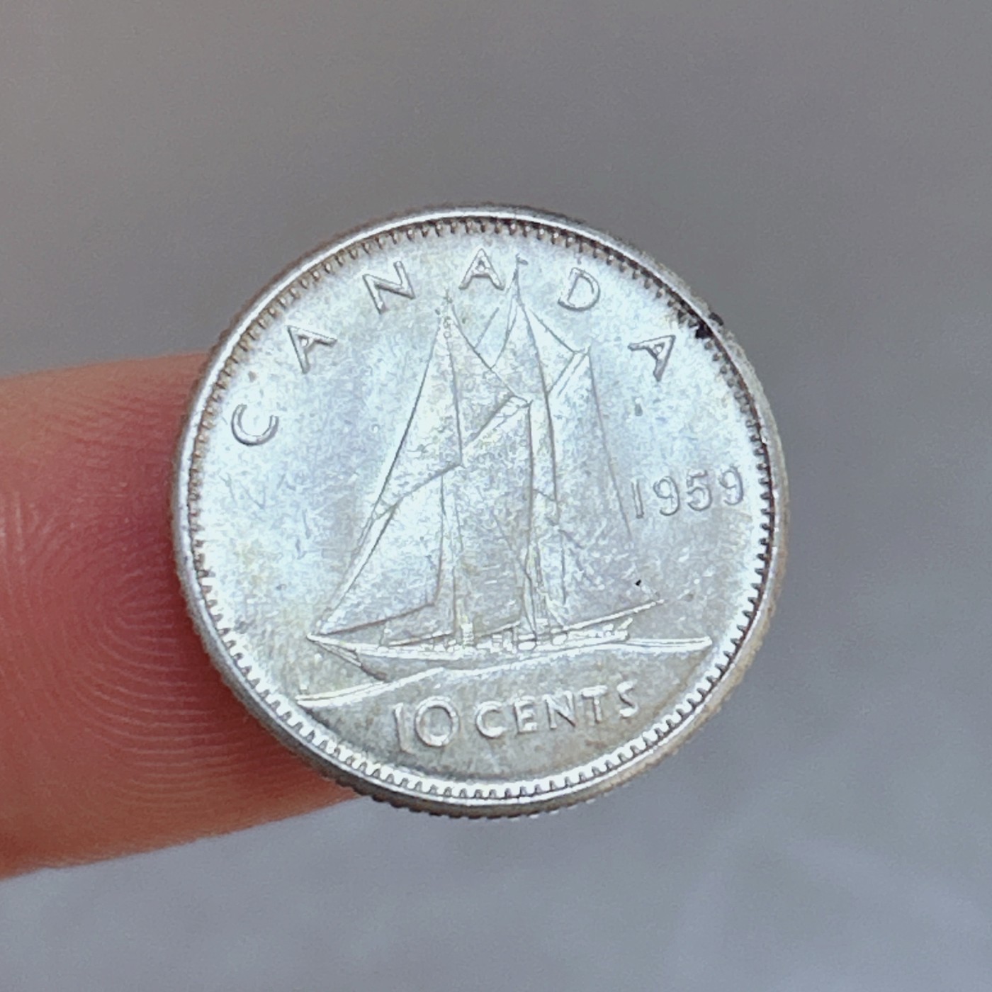 第一海外回流一元起拍收藏 银币专场 第70期 1959年加拿大联邦伊丽莎白二世少女版10分小银币 2.3g