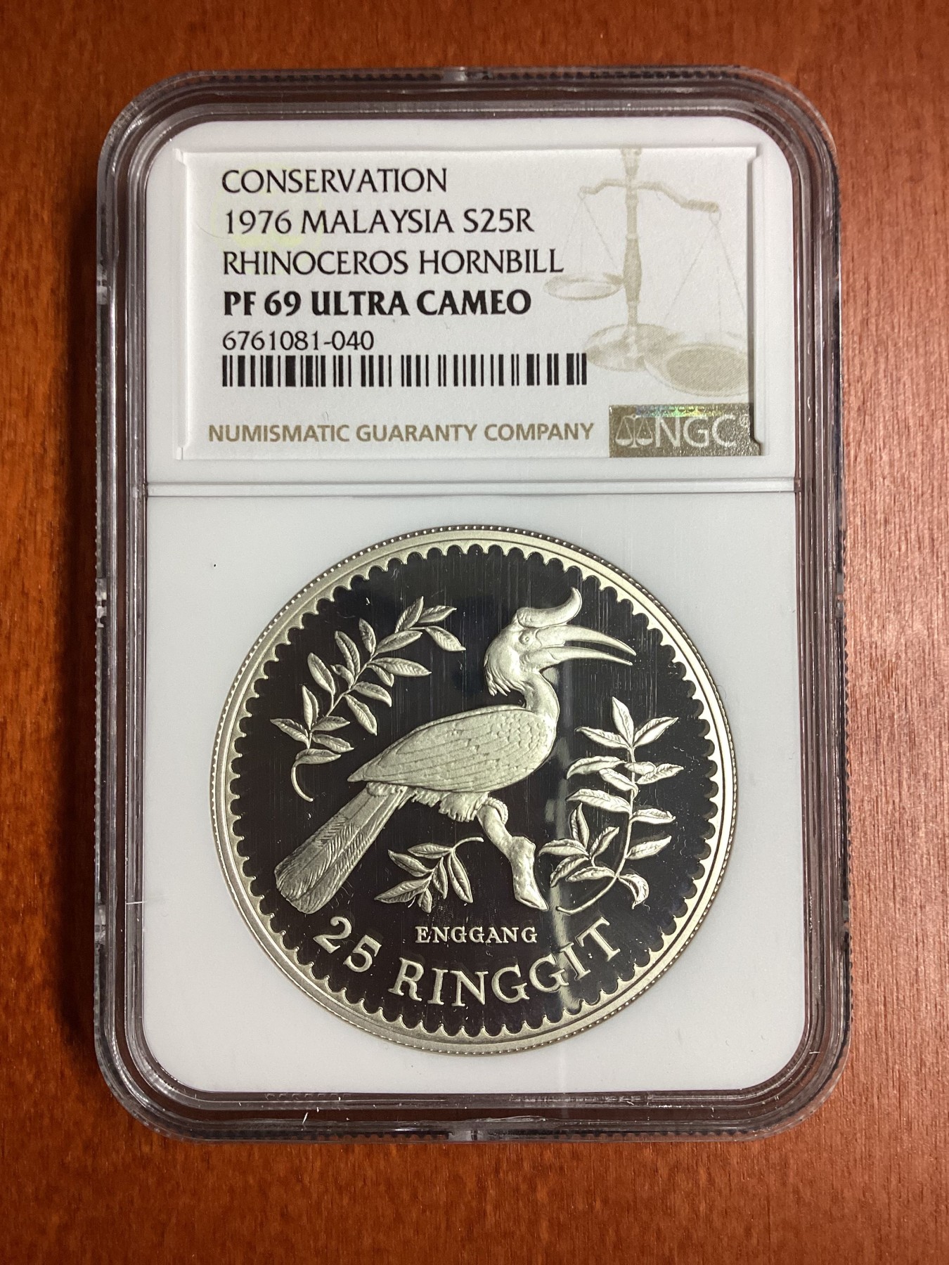 长老汇龙年精选第二场 1976 马来西亚动物保护独角马来犀鸟25吉林特精制银币，NGC PF69UC，发行量8008枚