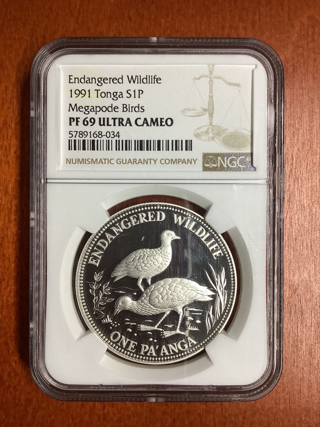 长老汇龙年精选第二场 1991 汤加濒危动物保护冢雉1潘加精制银币，NGC PF69UC，唯二冠军分