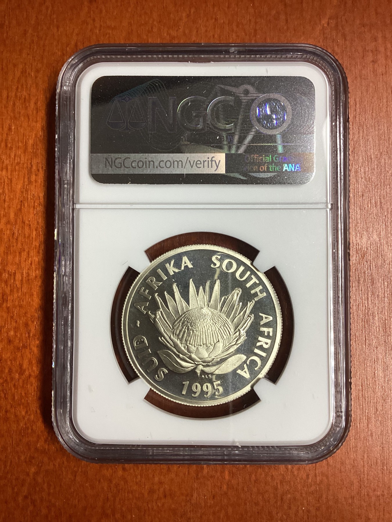 长老汇龙年精选第二场 1995 南非火车百年1朗德精制银币，NGC PF68UC，发行量4491枚